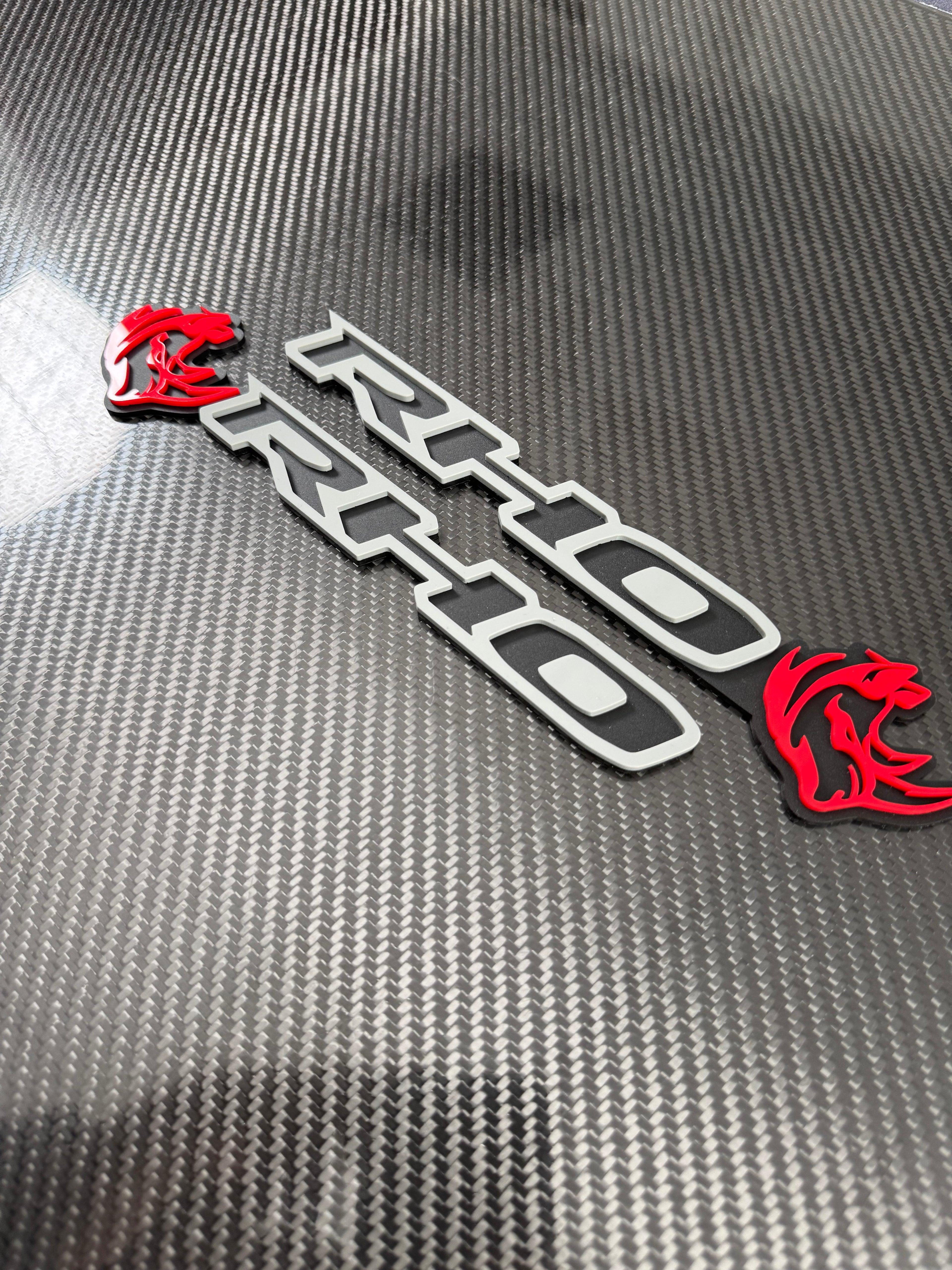 RHO/Rhino combo badge pair