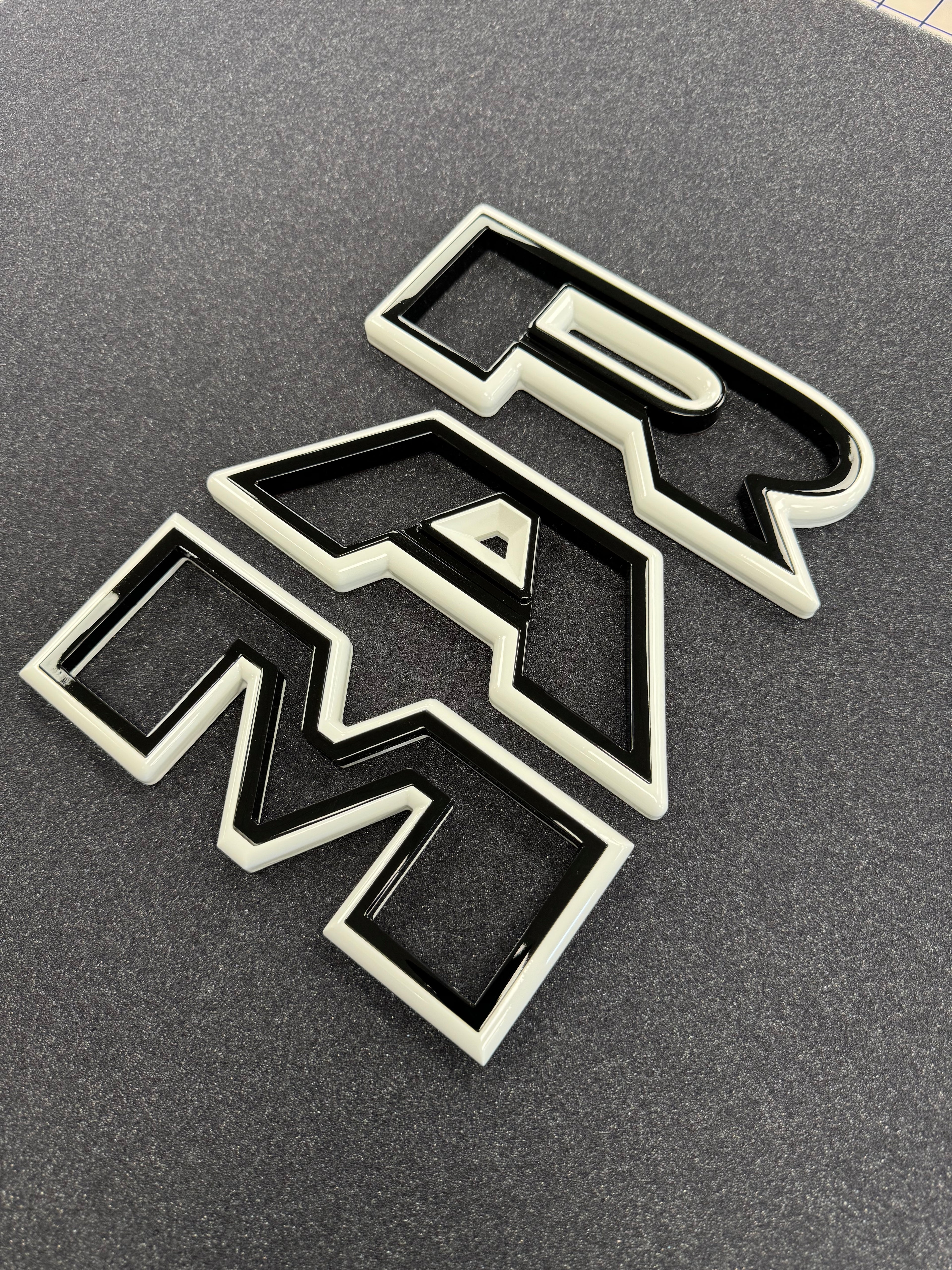 Color matched 3D RAM grille letters