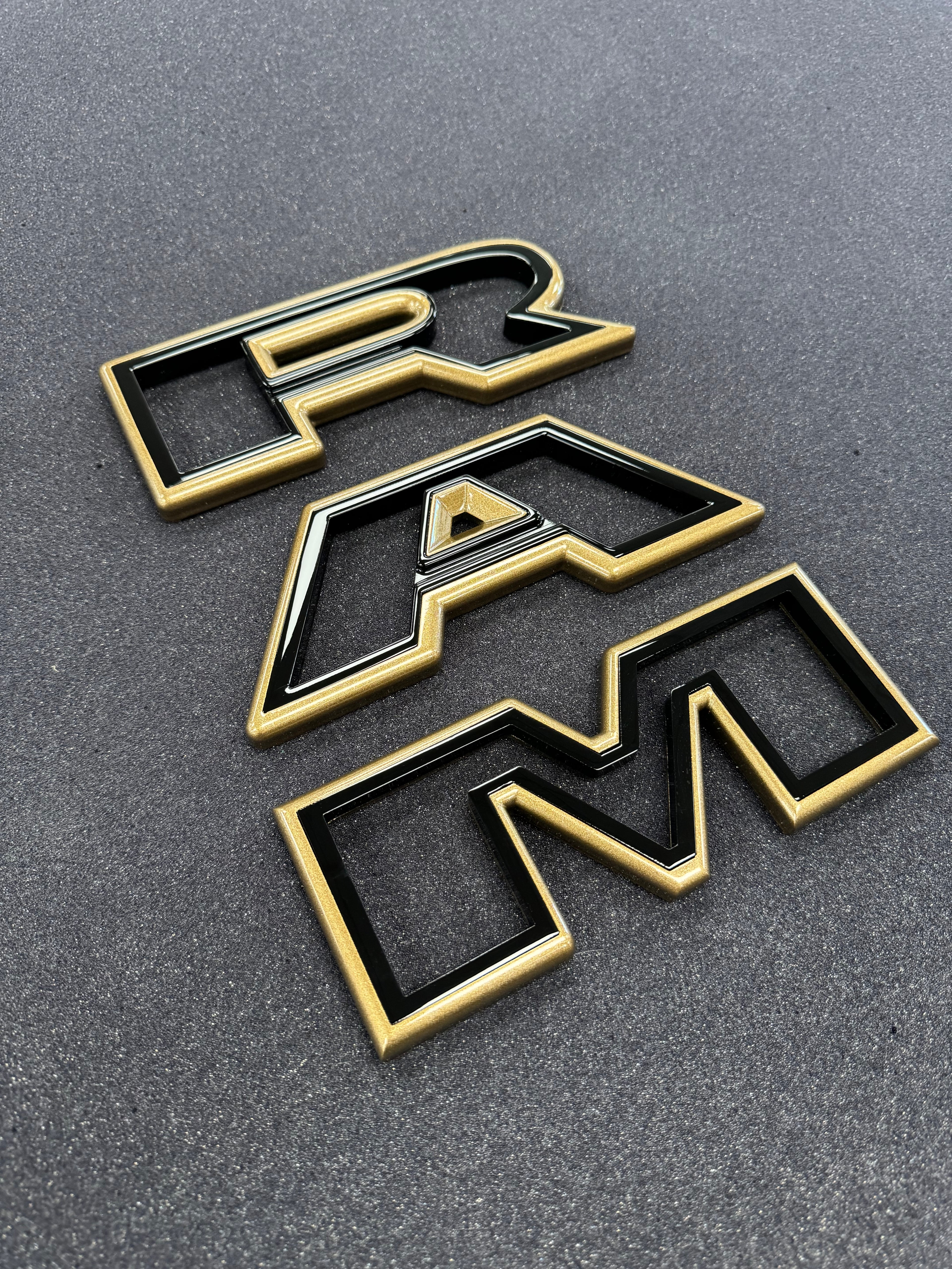 Color matched 3D RAM grille letters