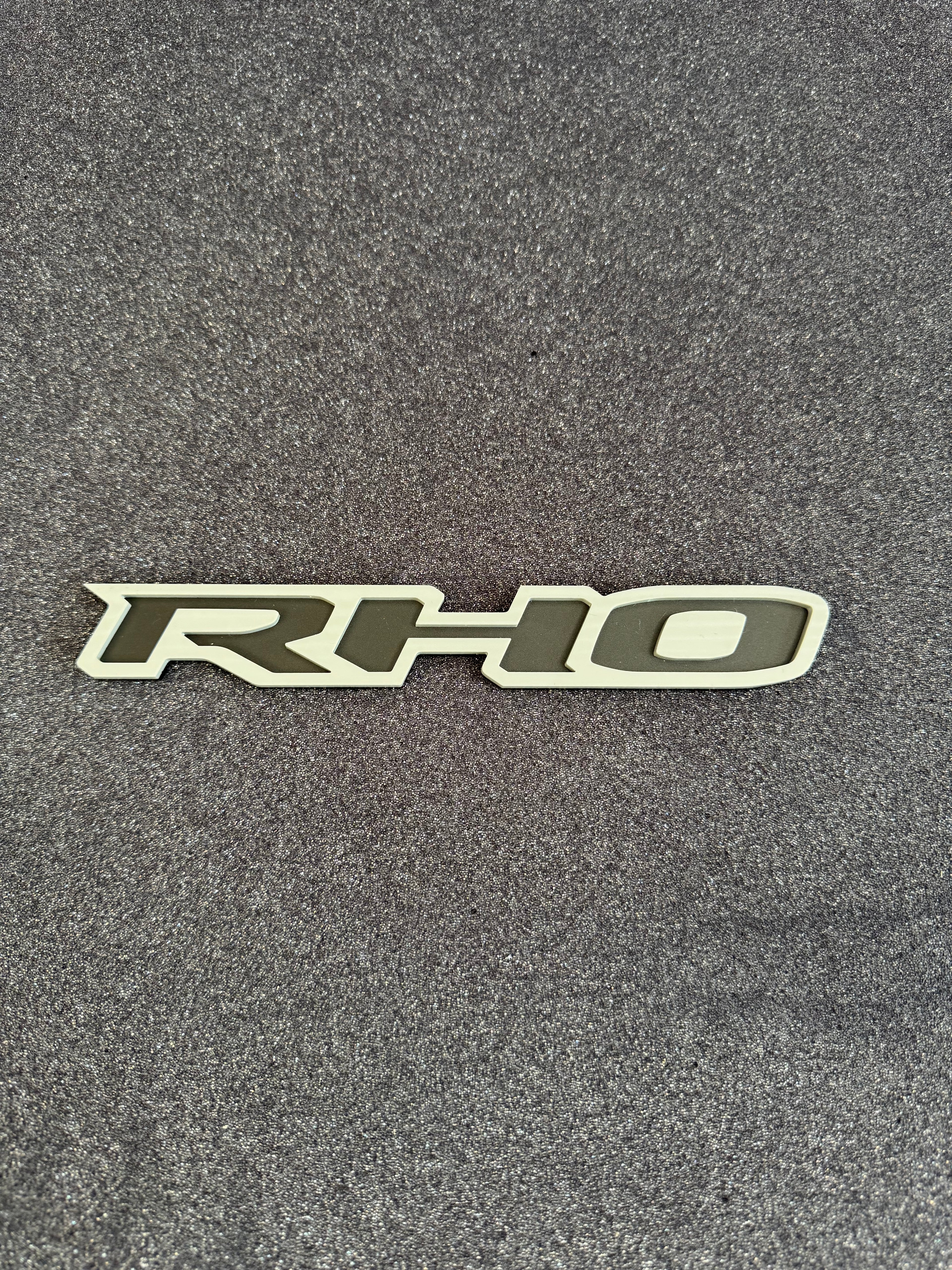 RHO small grille badge