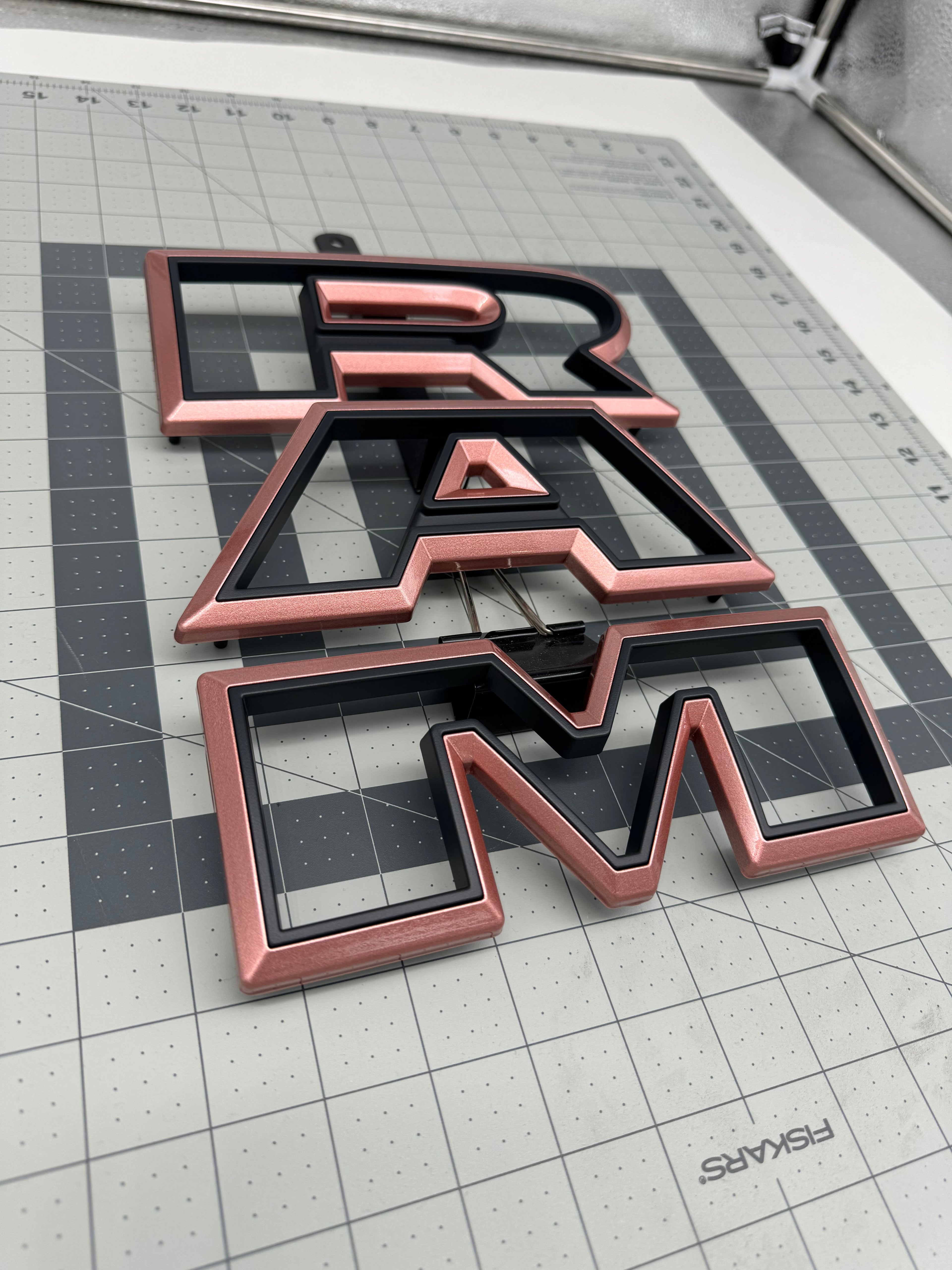 Color matched 3D RAM grille letters