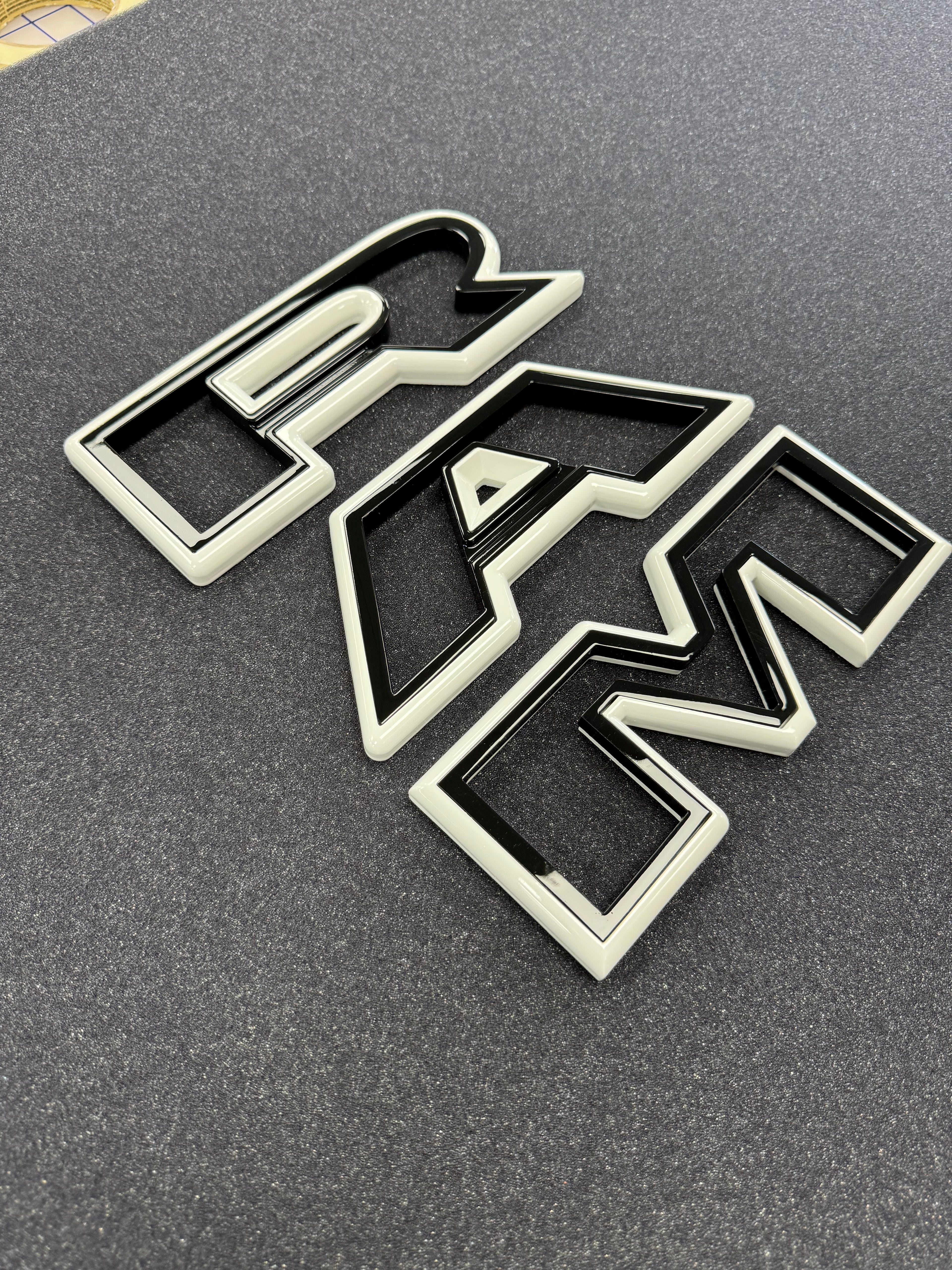 Color matched 3D RAM grille letters