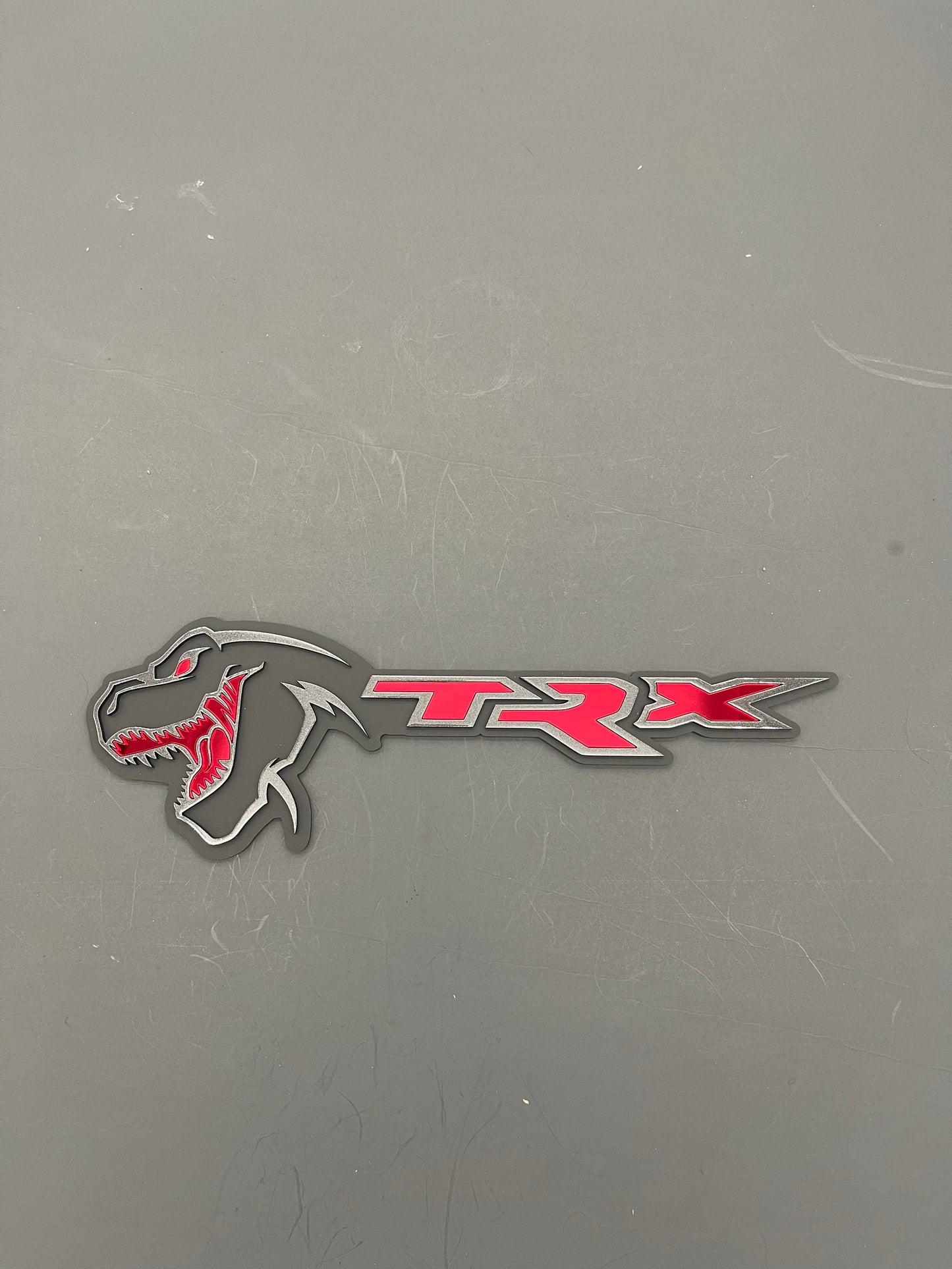 TREX/TRX combo badge single