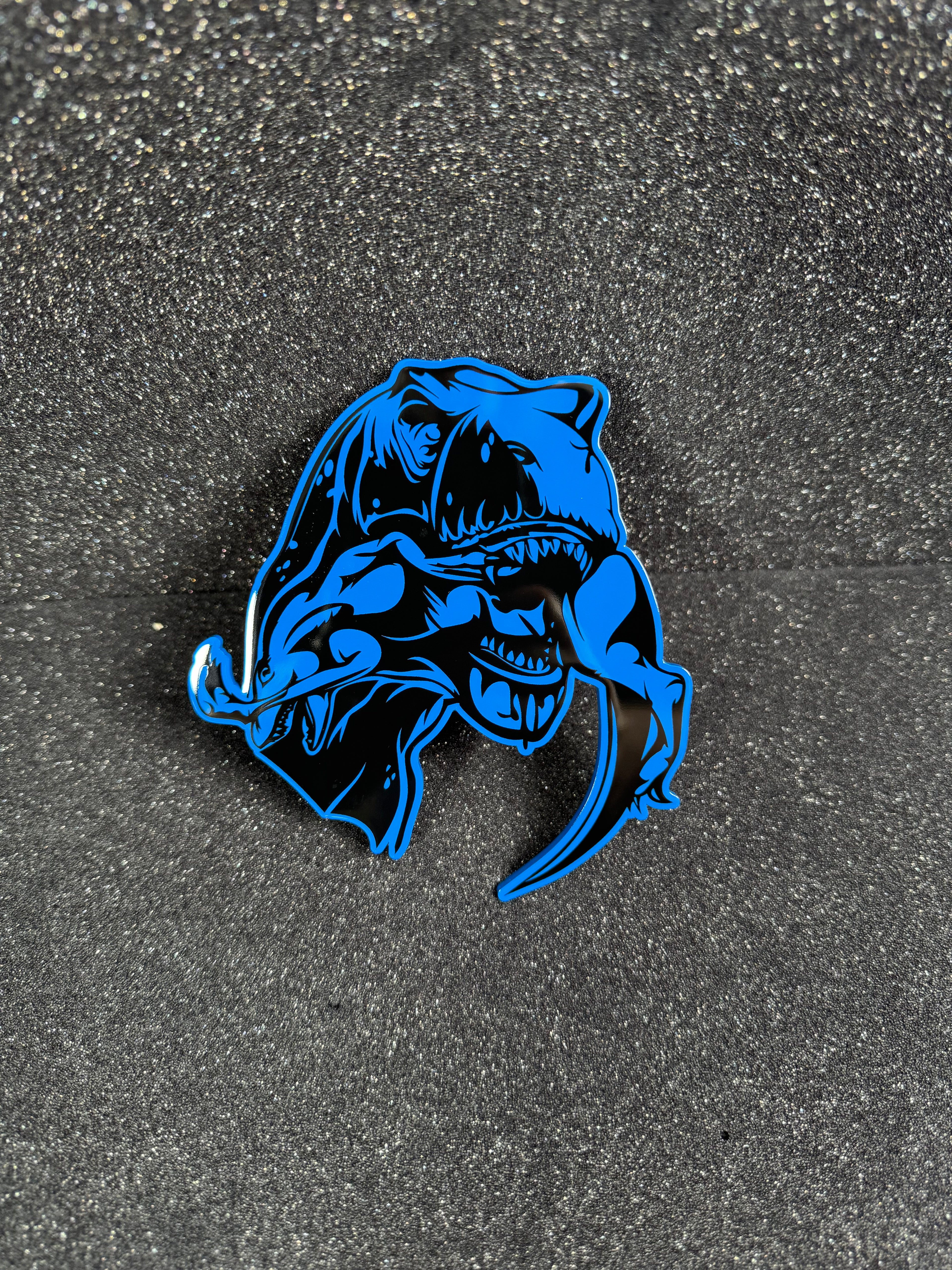 Trex eats raptor badge