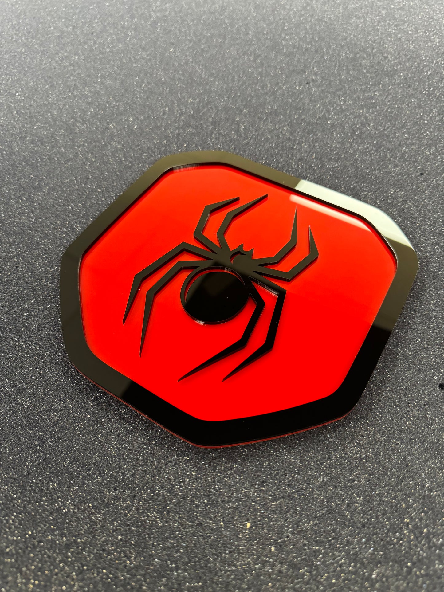 Black Widow Shield tailgate badge