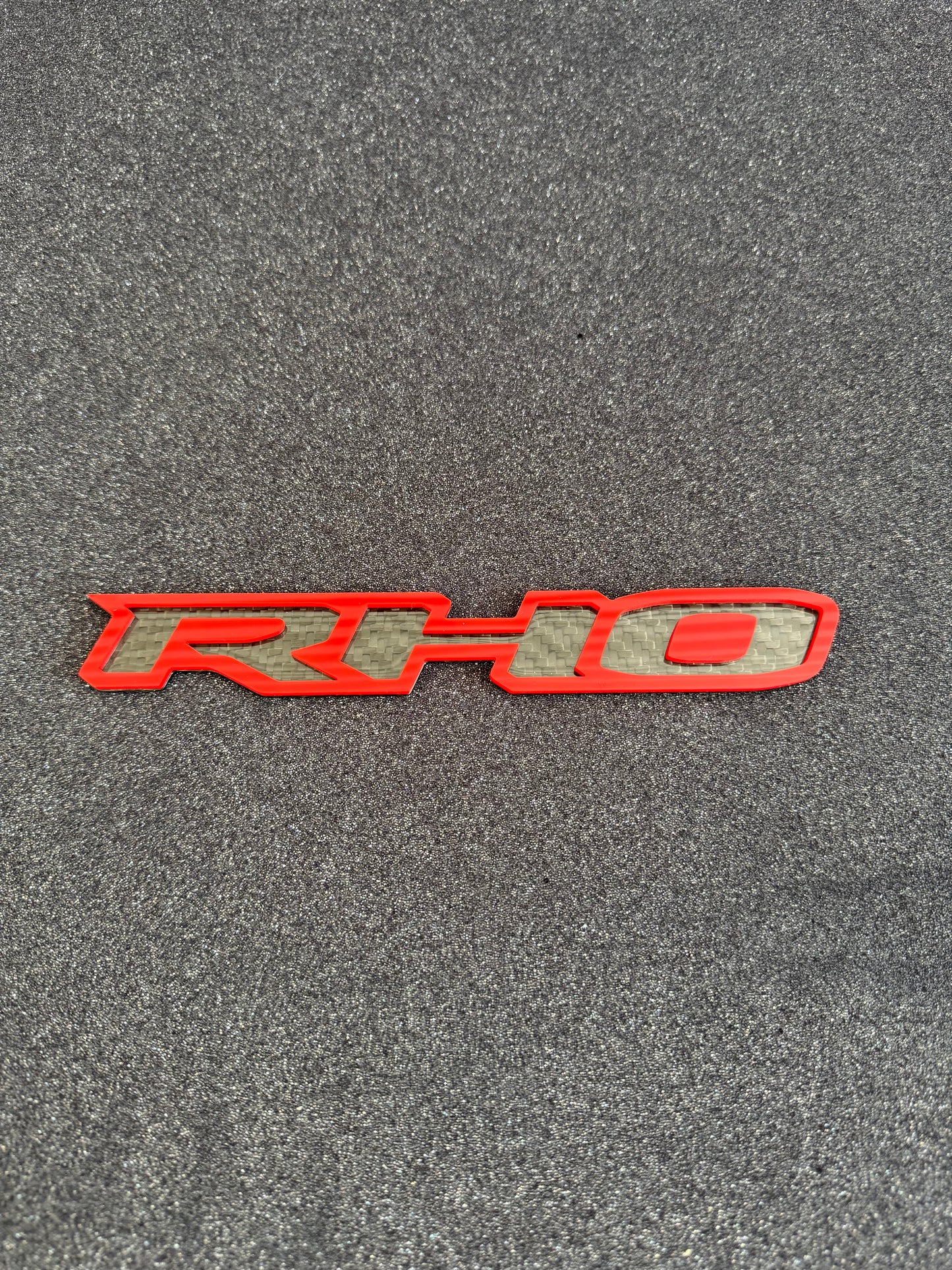 RHO small grille badge