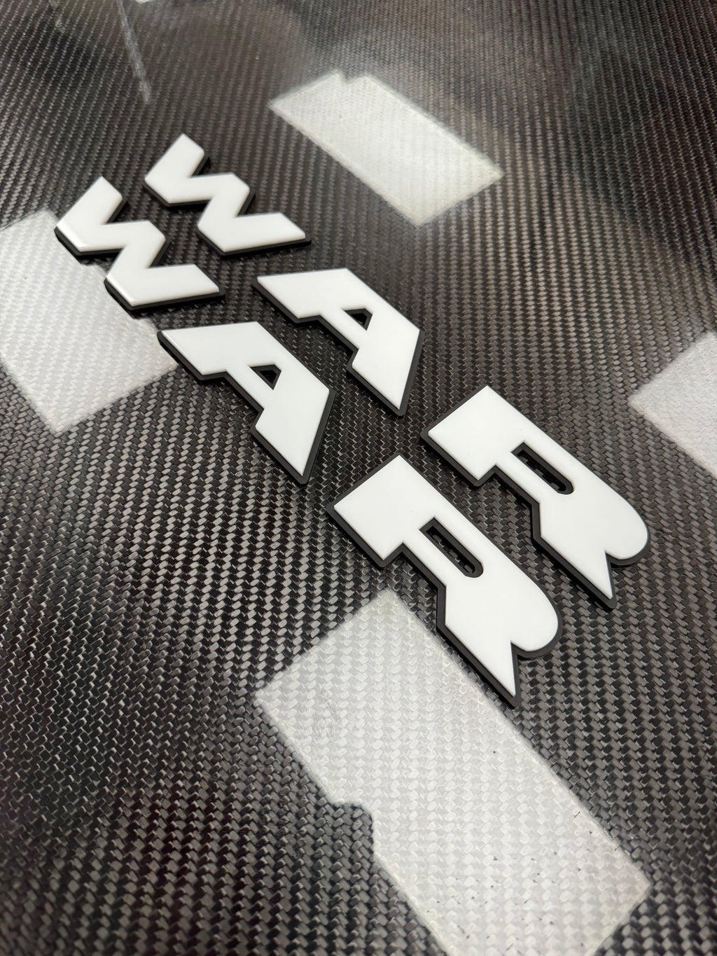 WAR door badge pair