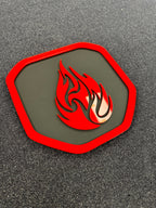 Flames Shield tailgate badge