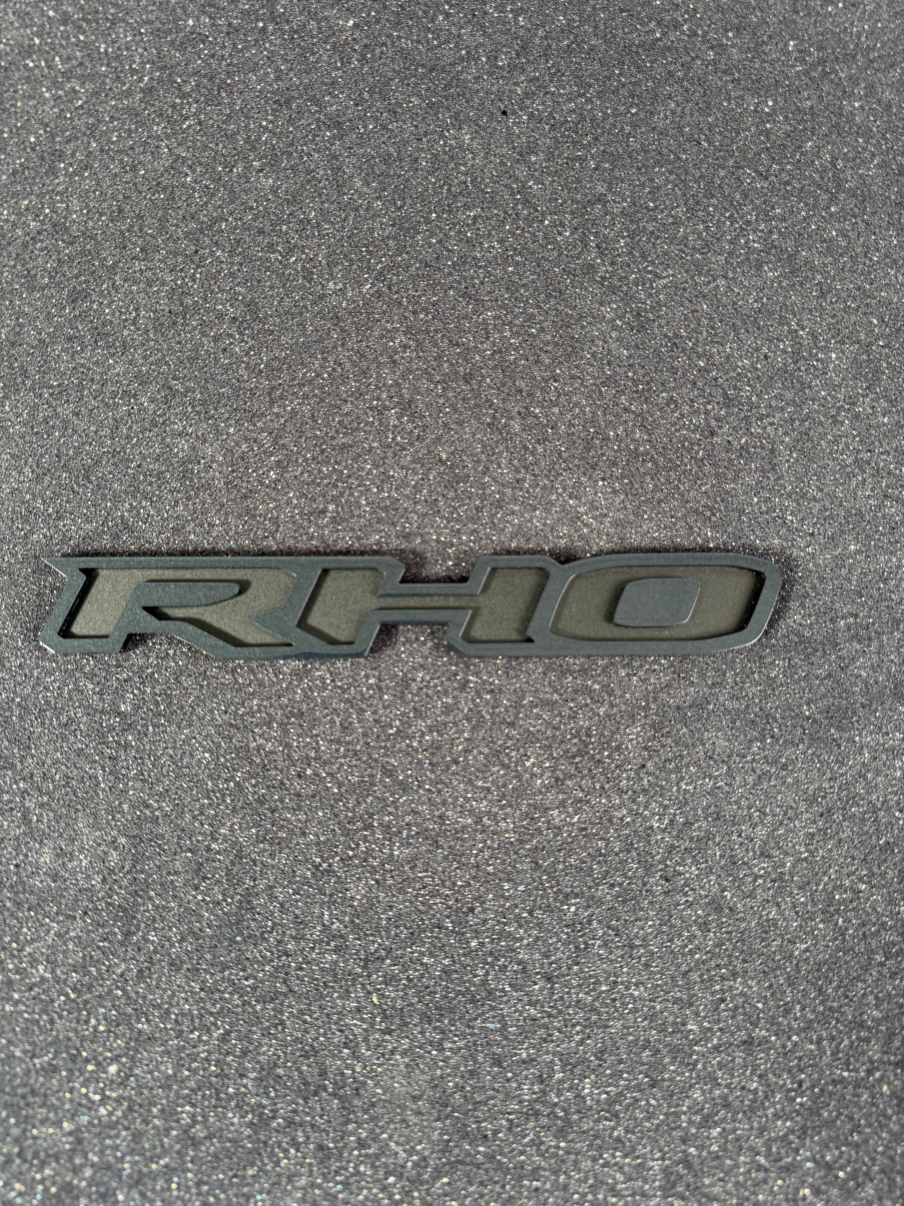 RHO small grille badge