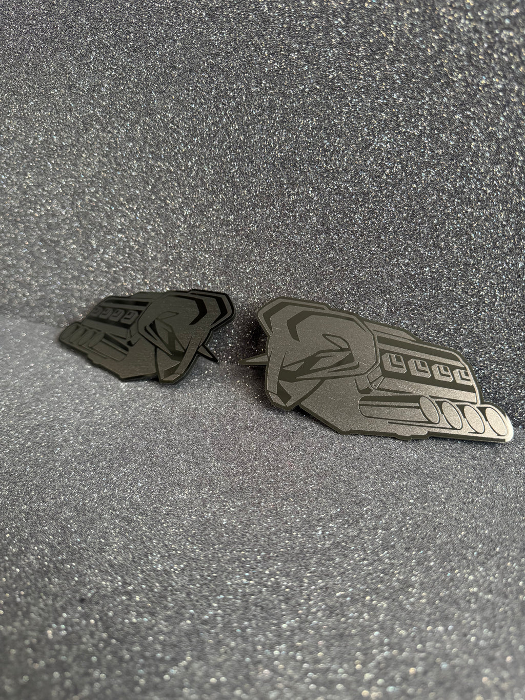 RAM's "symbol of protest" V8 badge pair
