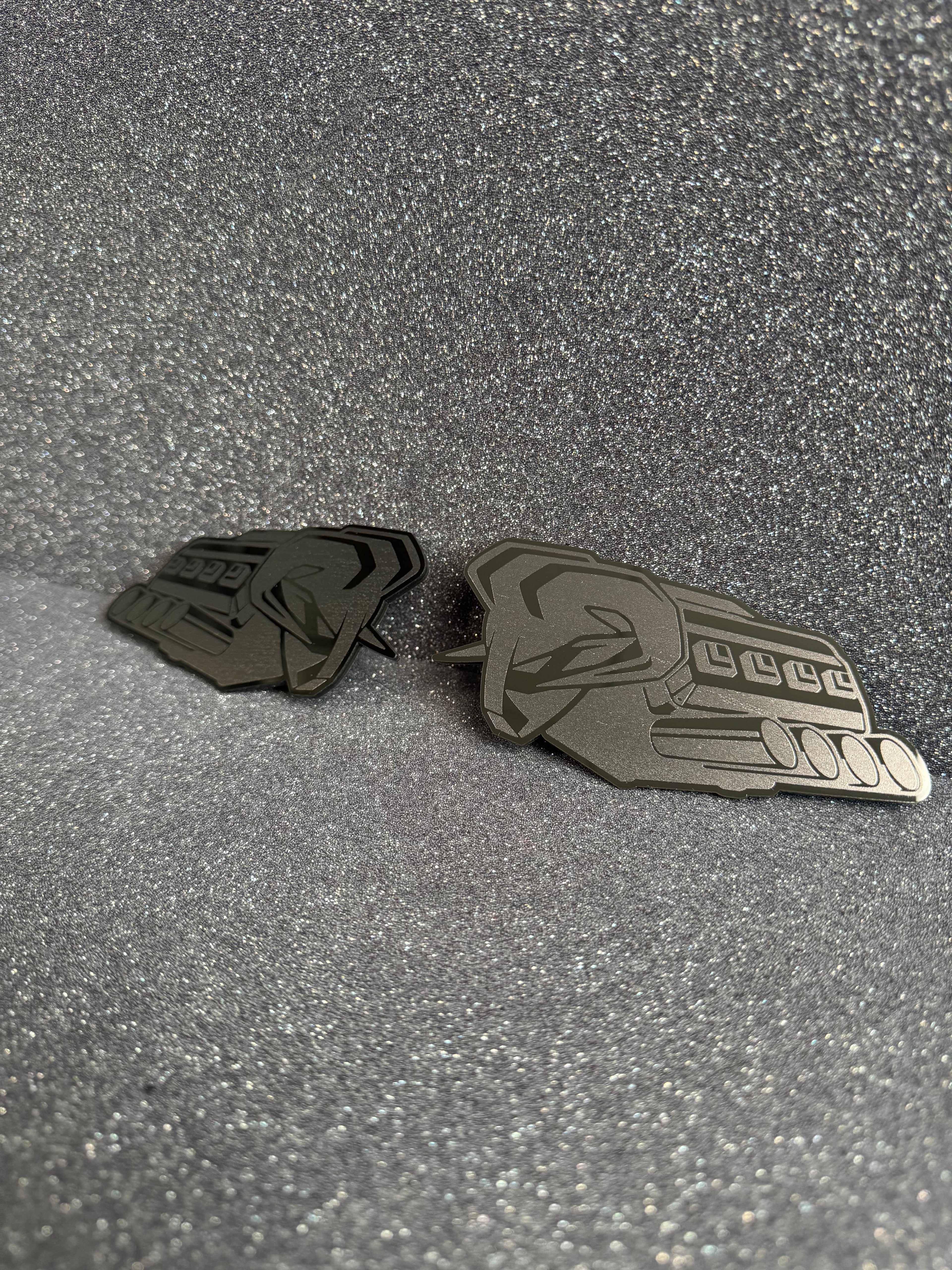 RAM's "symbol of protest" V8 badge pair