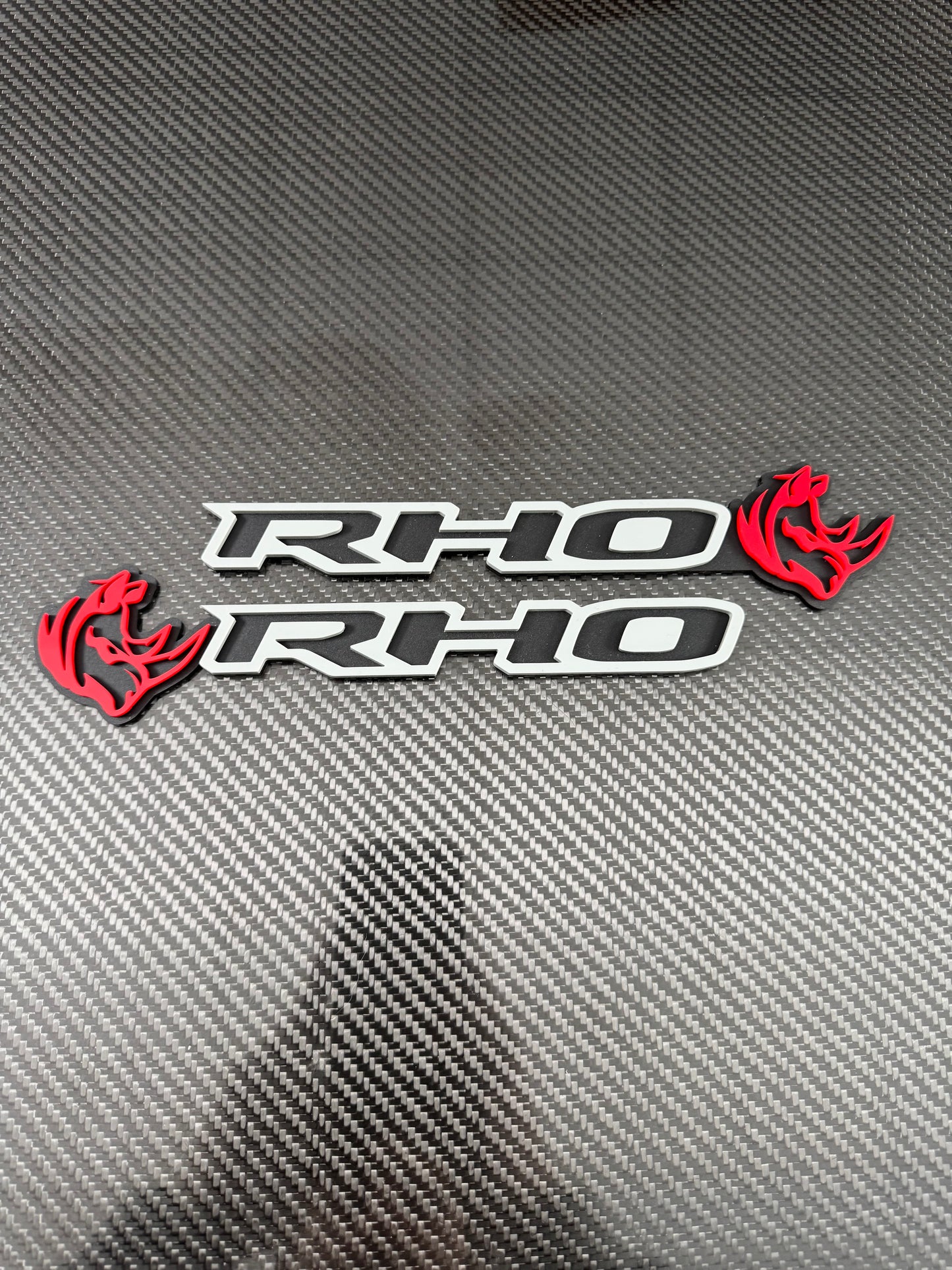 RHO/Rhino combo badge pair