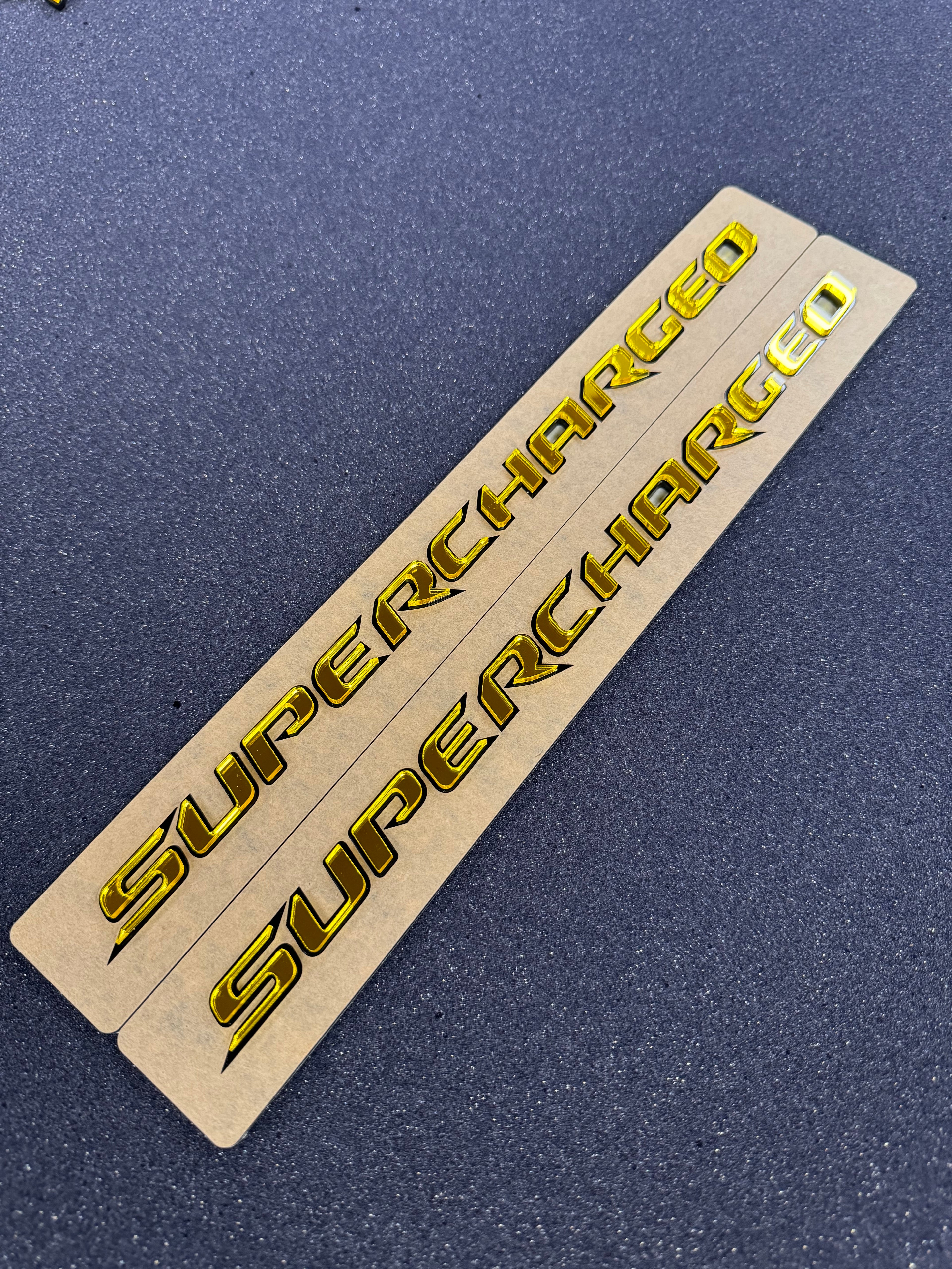 Trackhawk supercharged badge pair