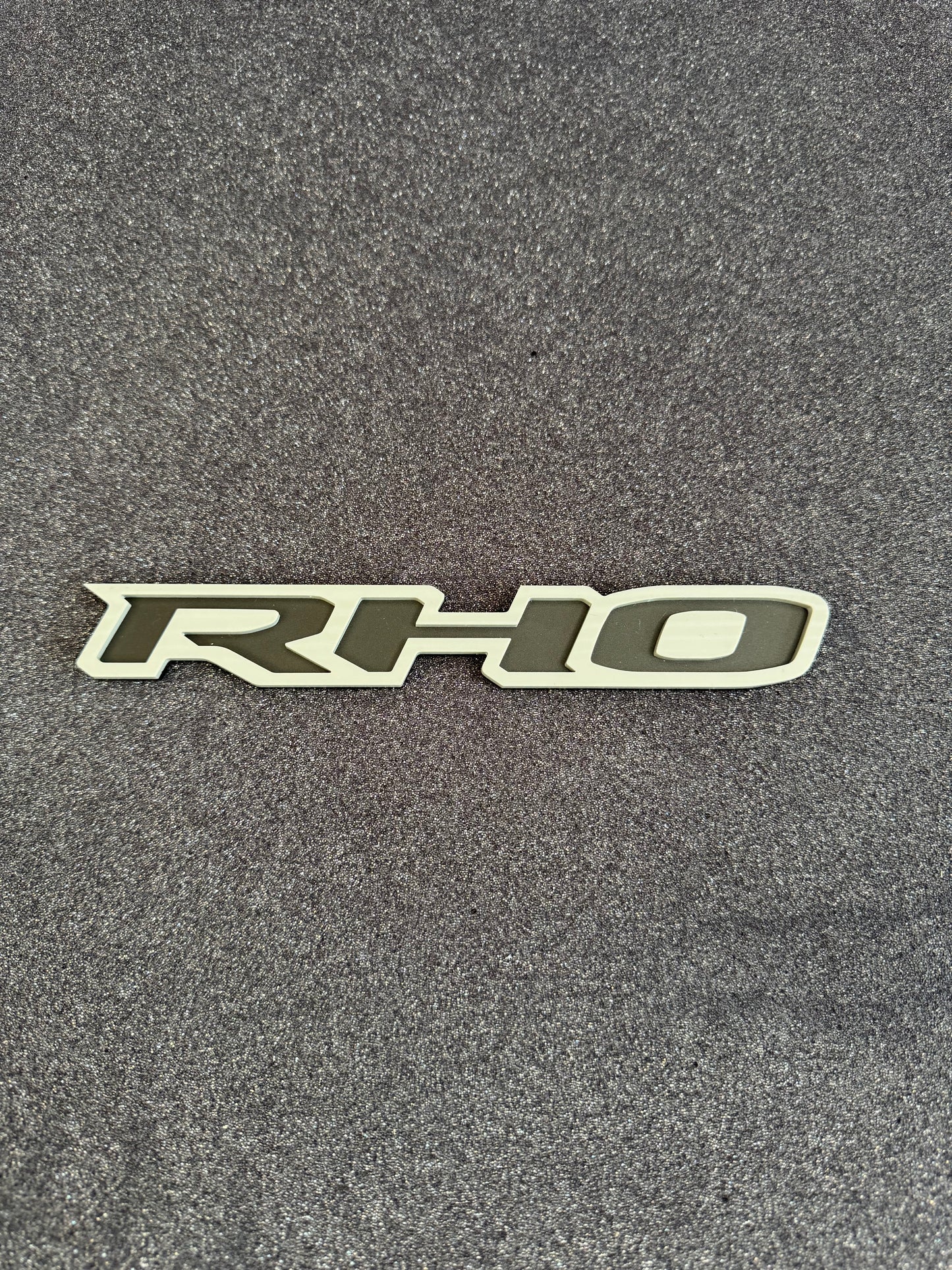 RHO small grille badge