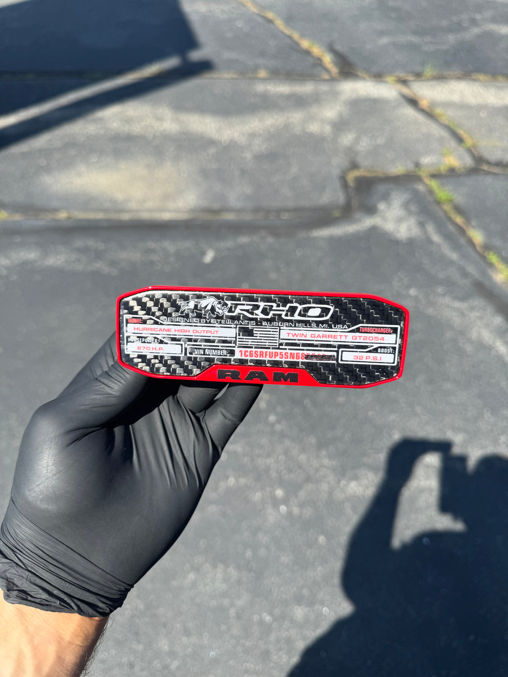 RHO center console replacement badge/emblem