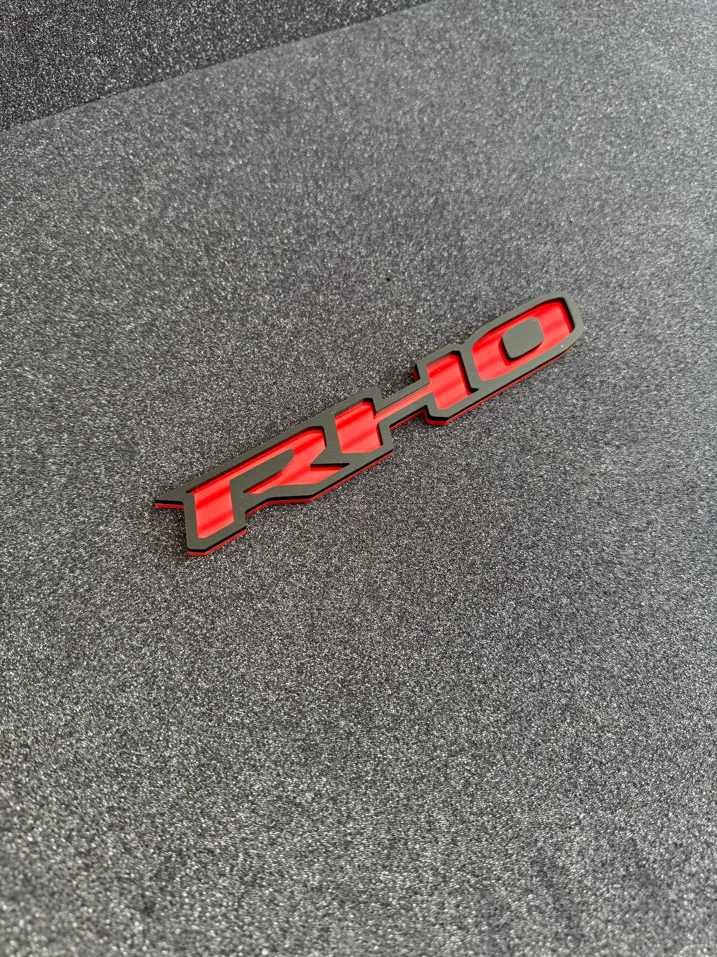 RHO small grille badge