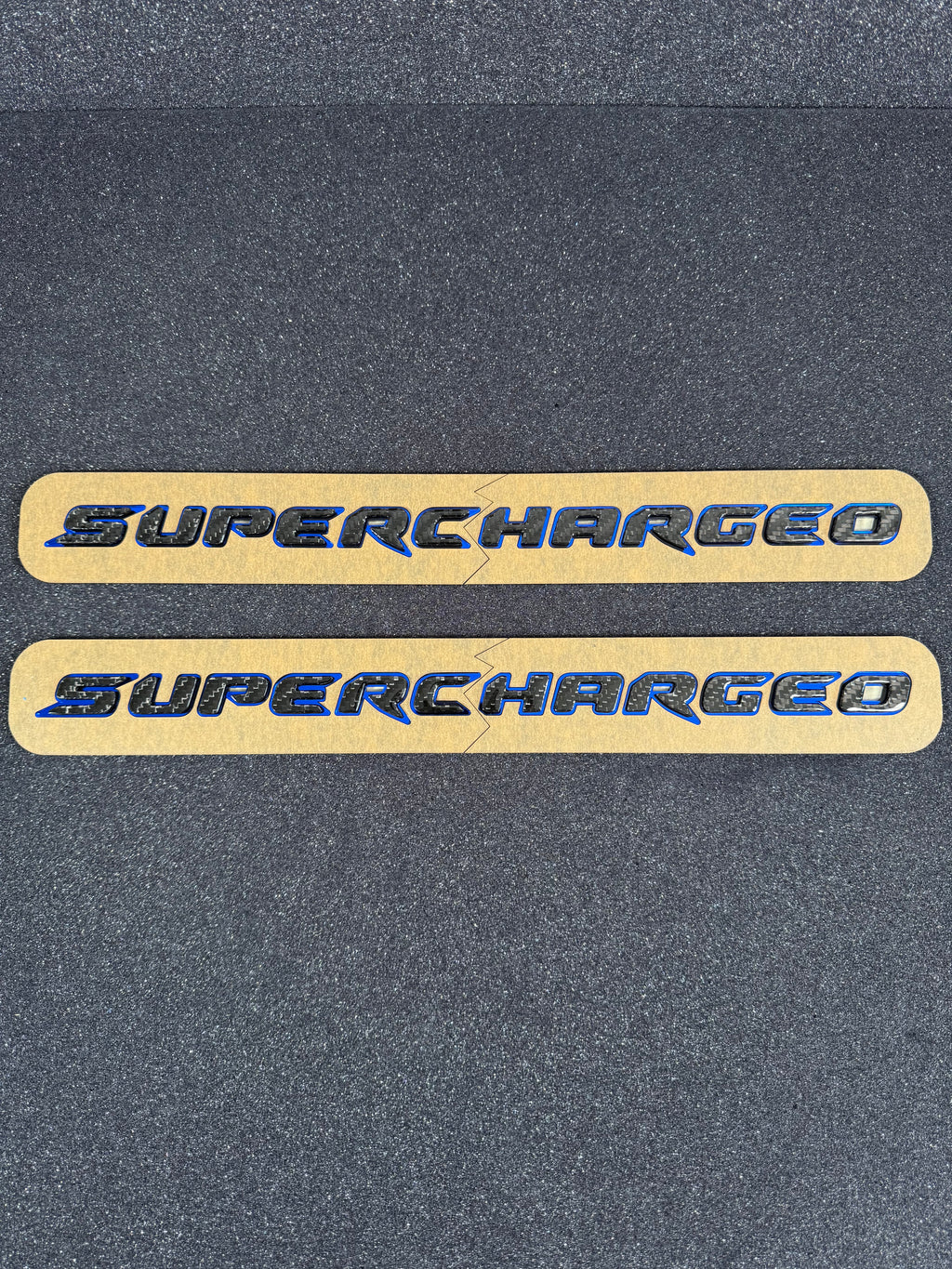 Trackhawk supercharged badge pair