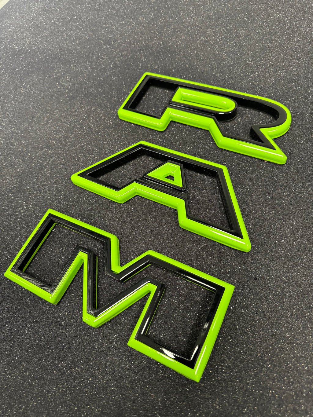 Color matched 3D RAM grille letters