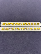 Trackhawk supercharged badge pair