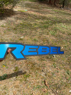 Rebel Grille badge replacement