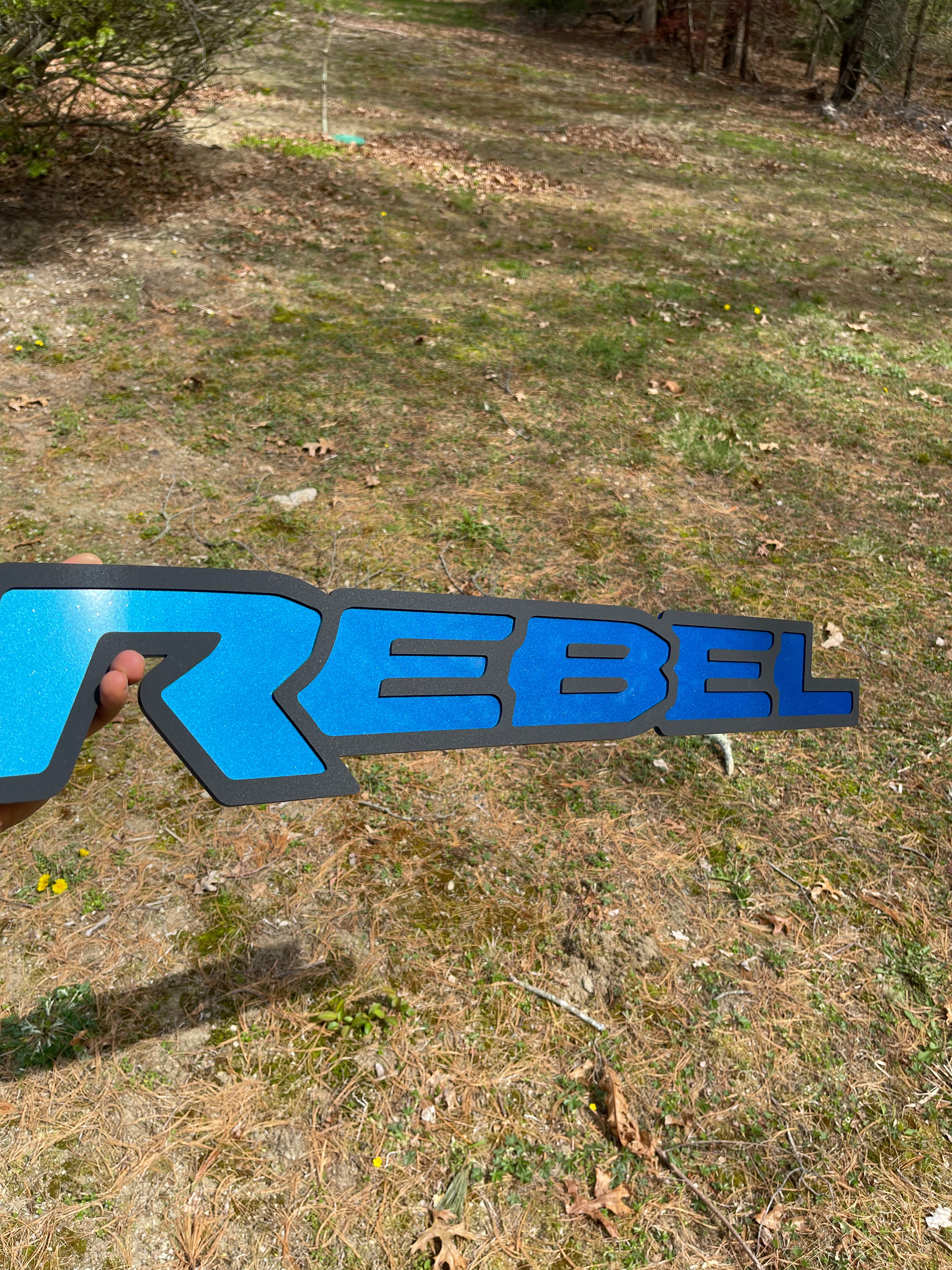 Rebel Grille badge replacement