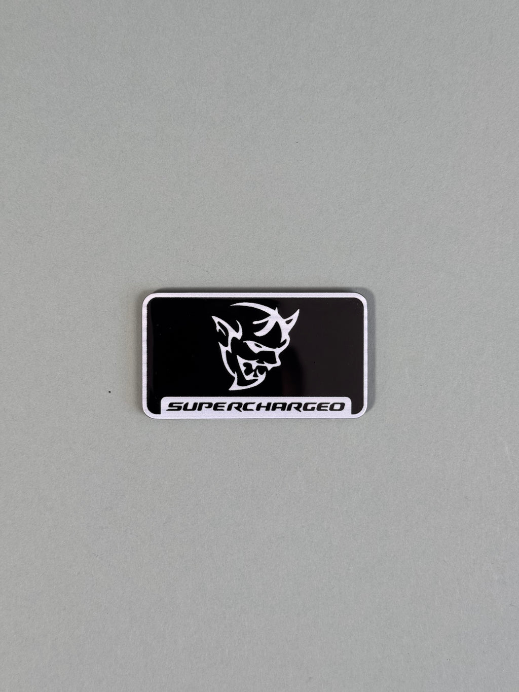 Supercharger engine lid badge/emblem