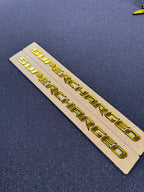 Trackhawk supercharged badge pair