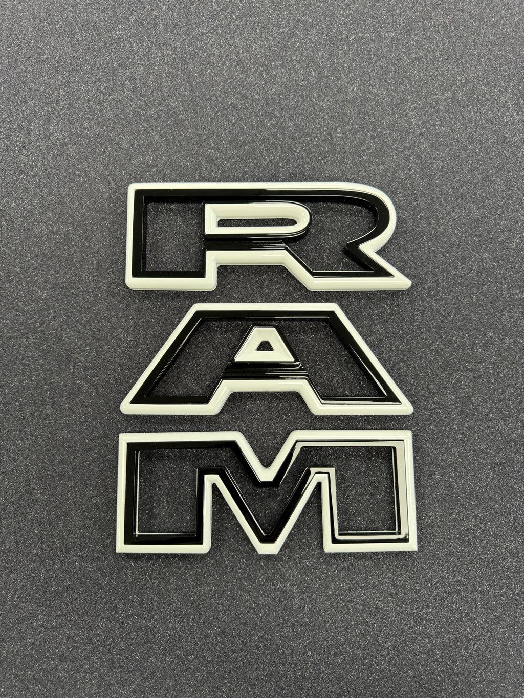 Color matched 3D RAM grille letters