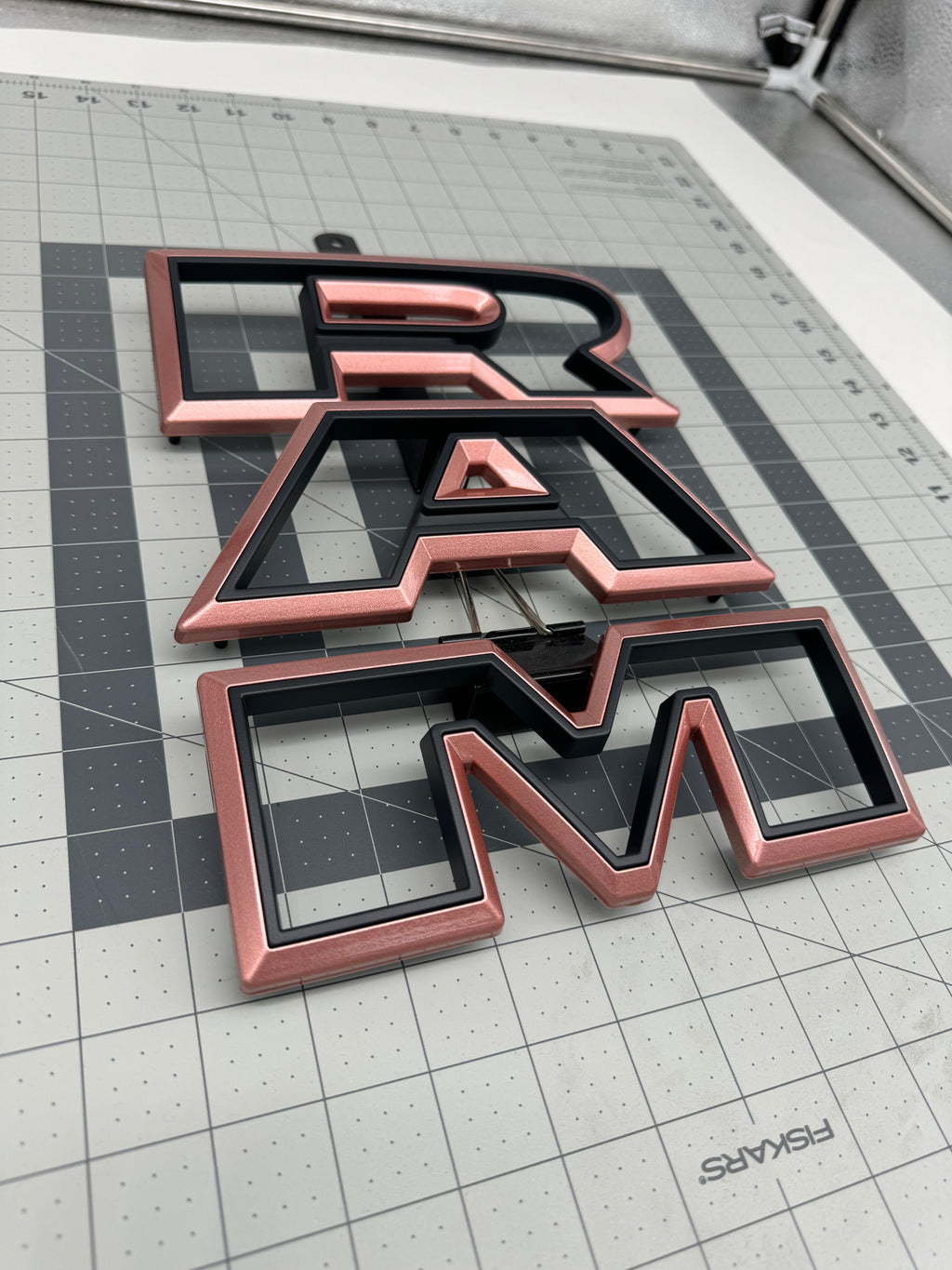 Color matched 3D RAM grille letters