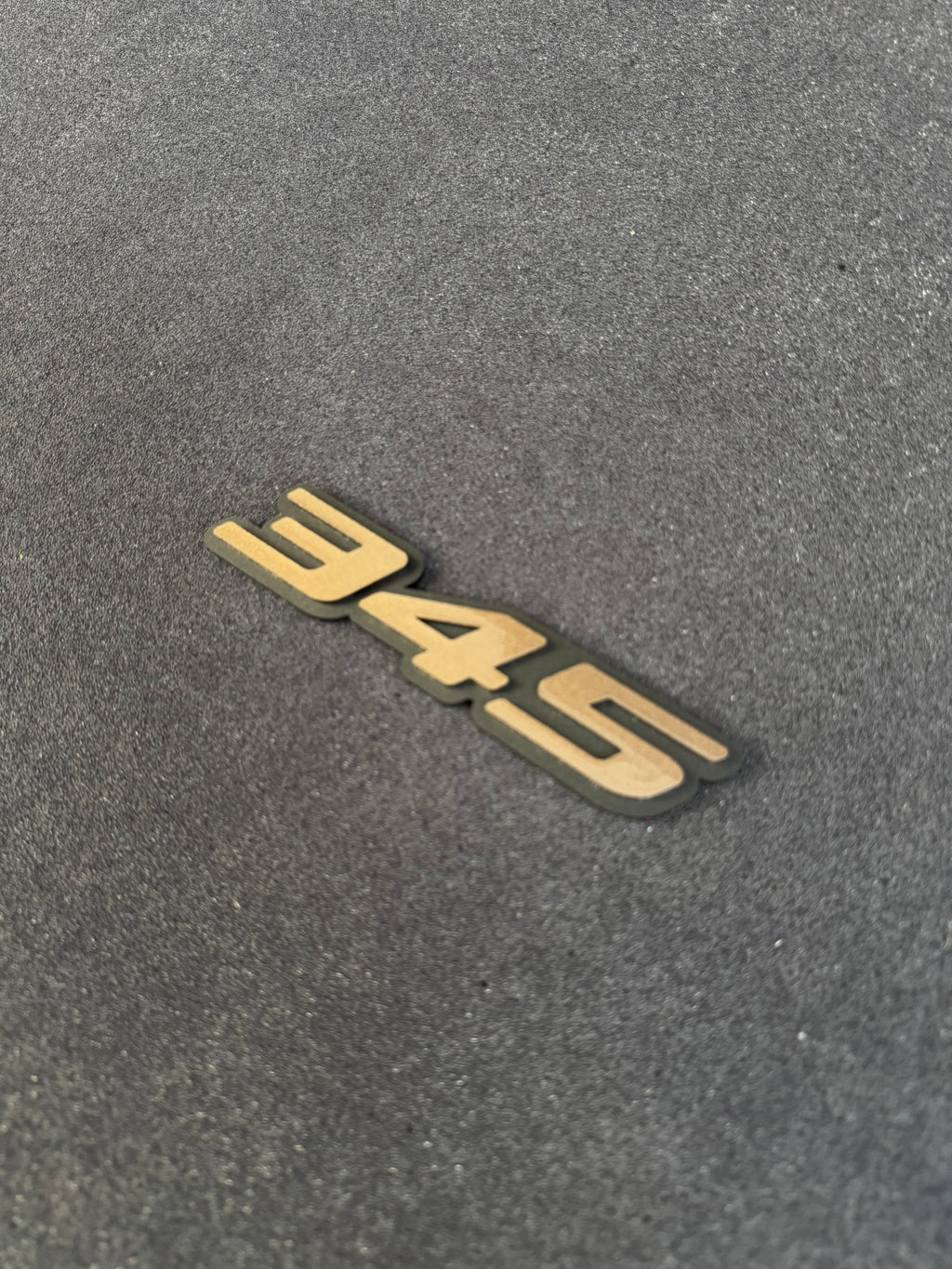 345 grille badge