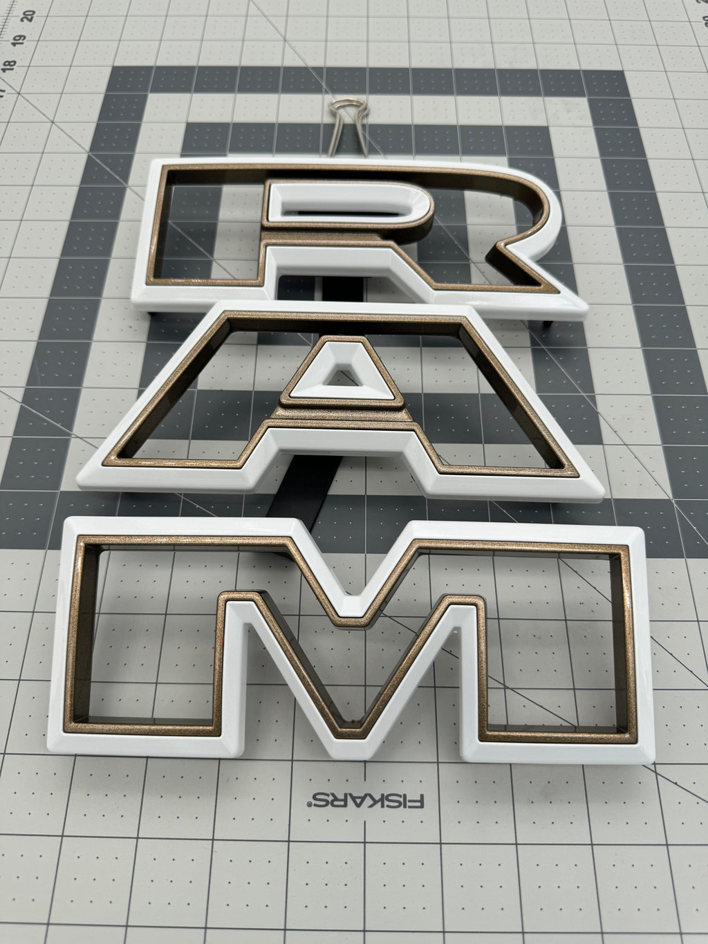 Color matched 3D RAM grille letters