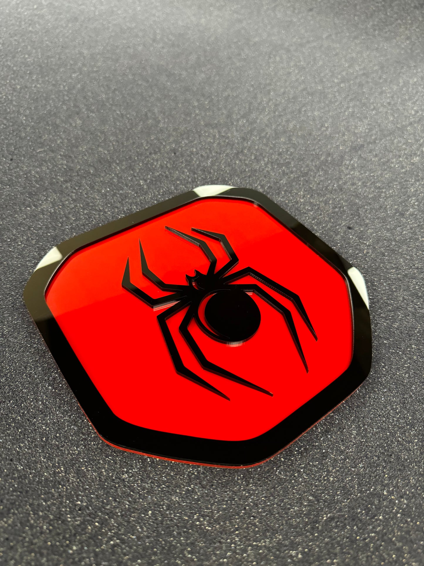 Black Widow Shield tailgate badge