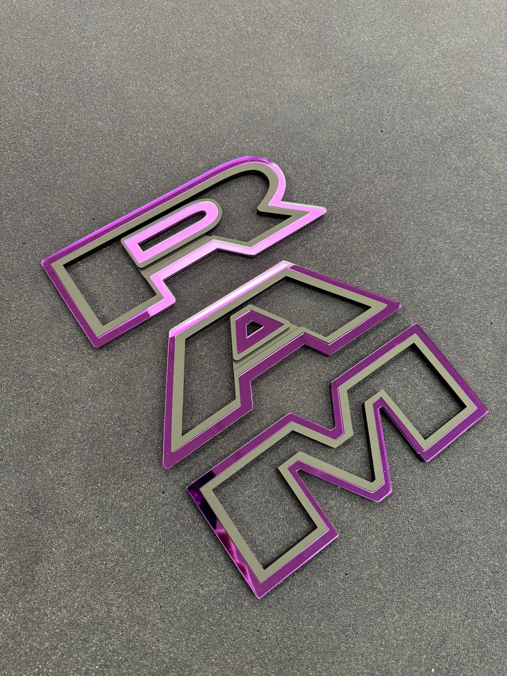 Color matched 3D RAM grille letters