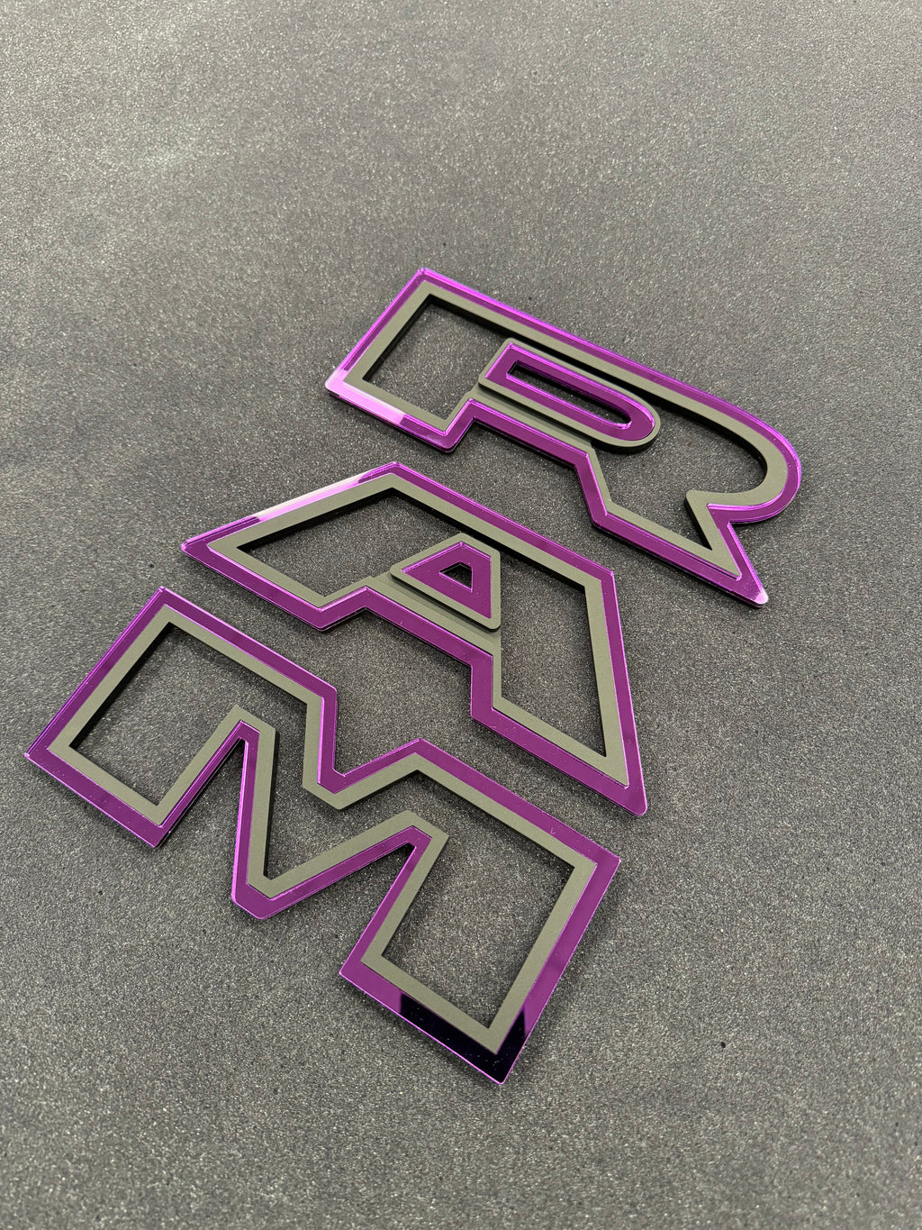 Color matched 3D RAM grille letters