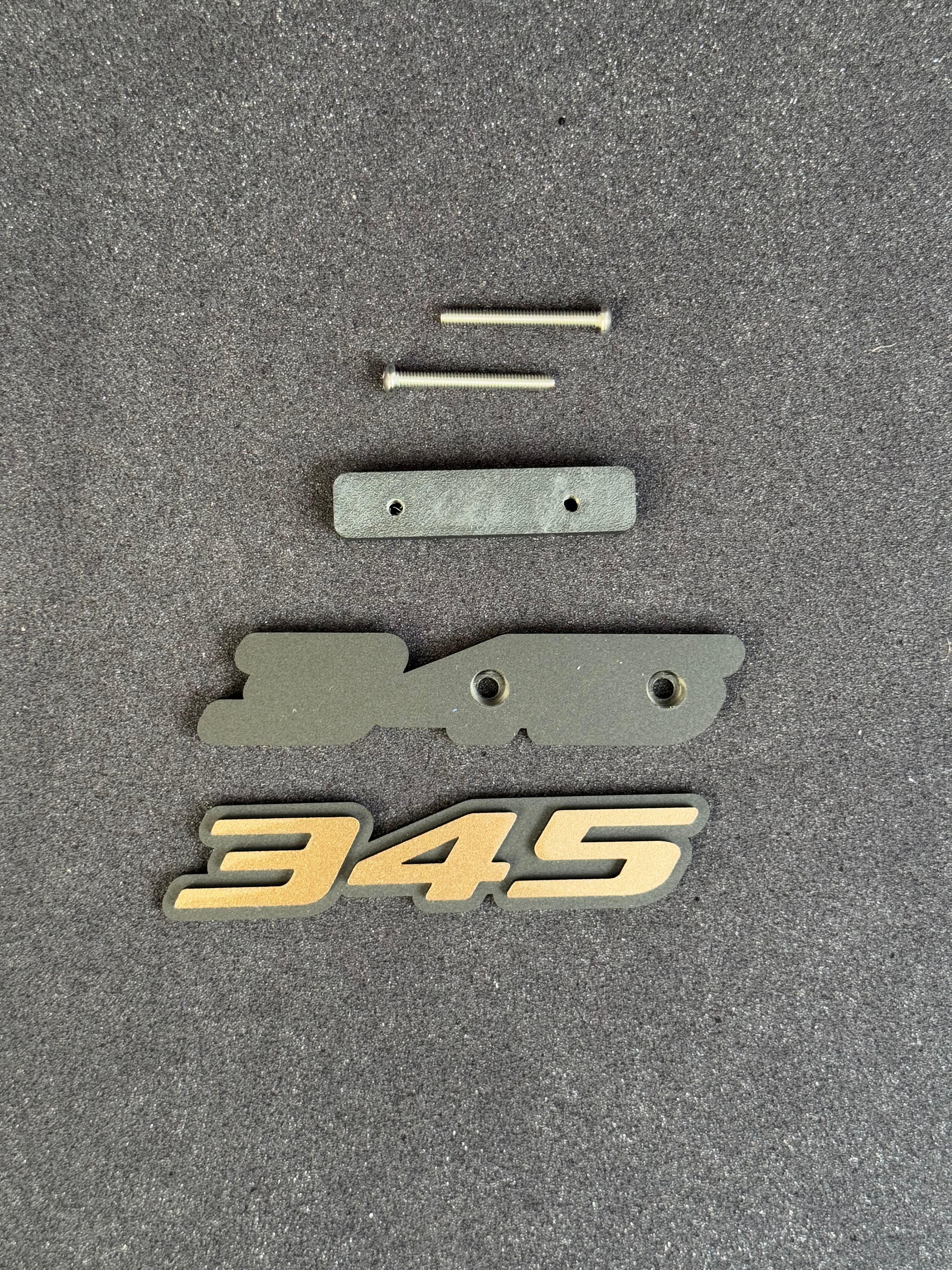345 grille badge
