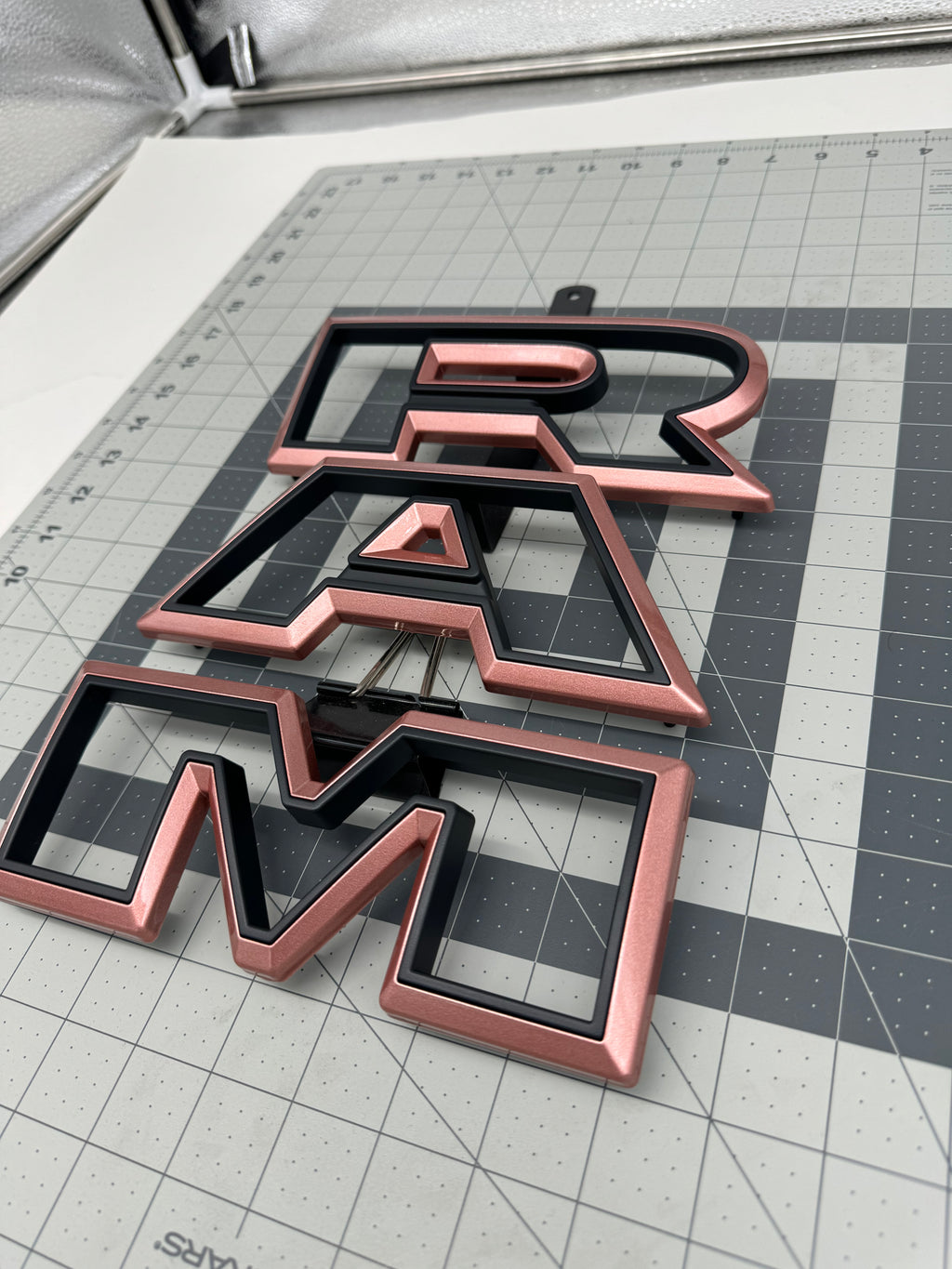 Color matched 3D RAM grille letters