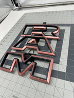 Color matched 3D RAM grille letters