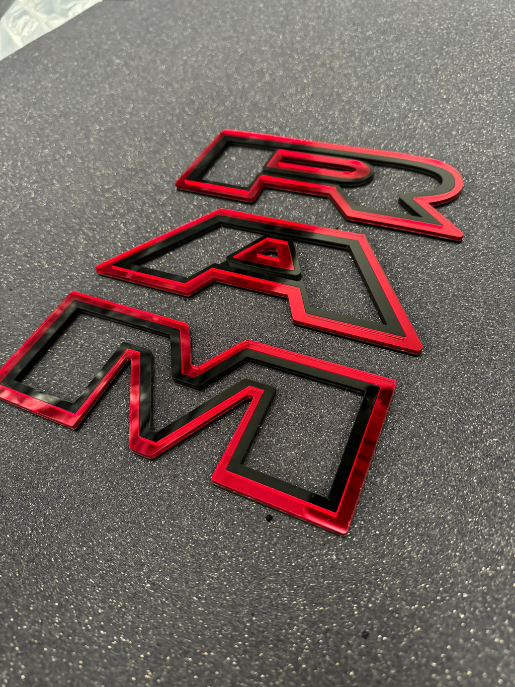 Color matched 3D RAM grille letters