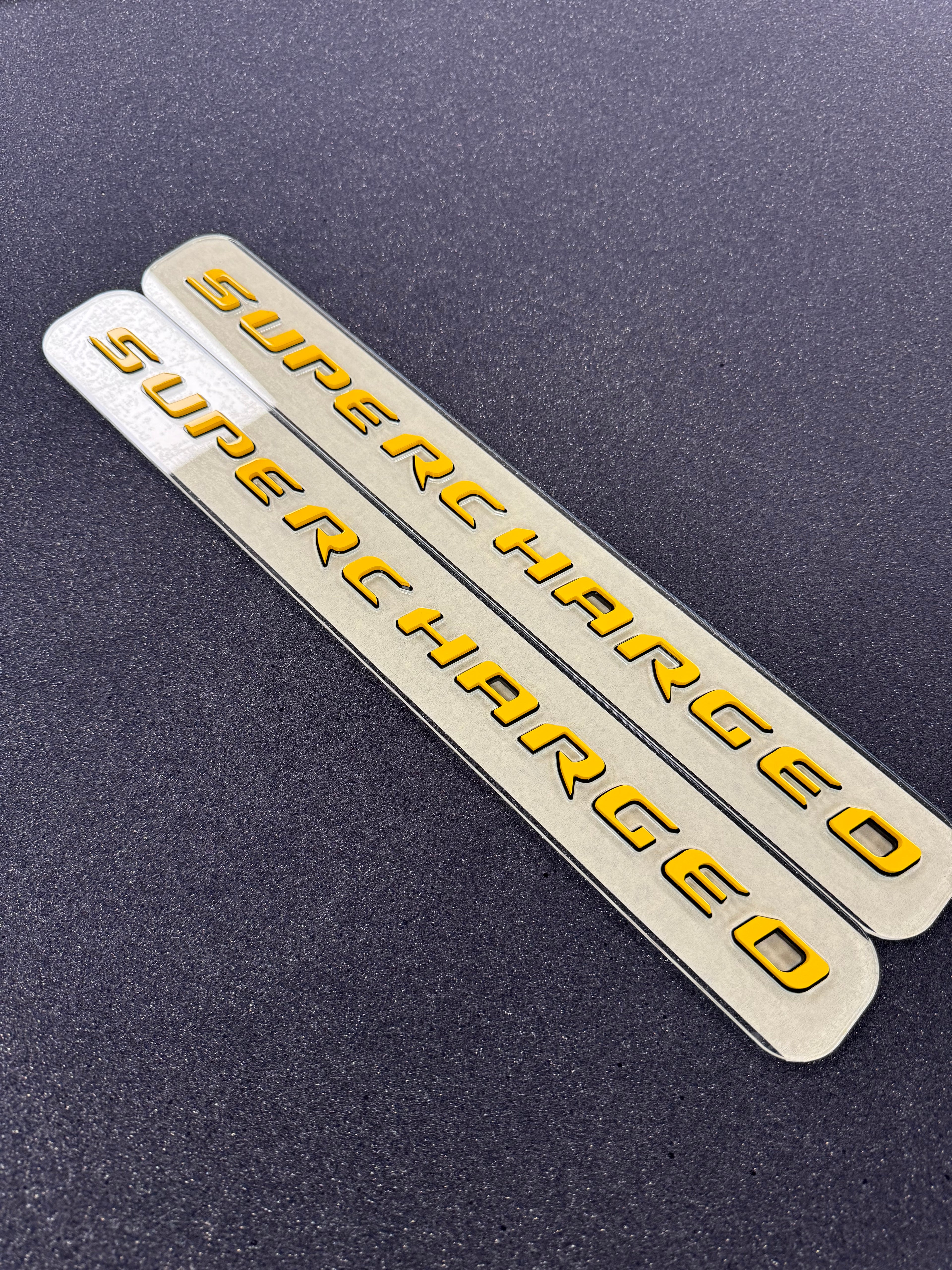 Trackhawk supercharged badge pair