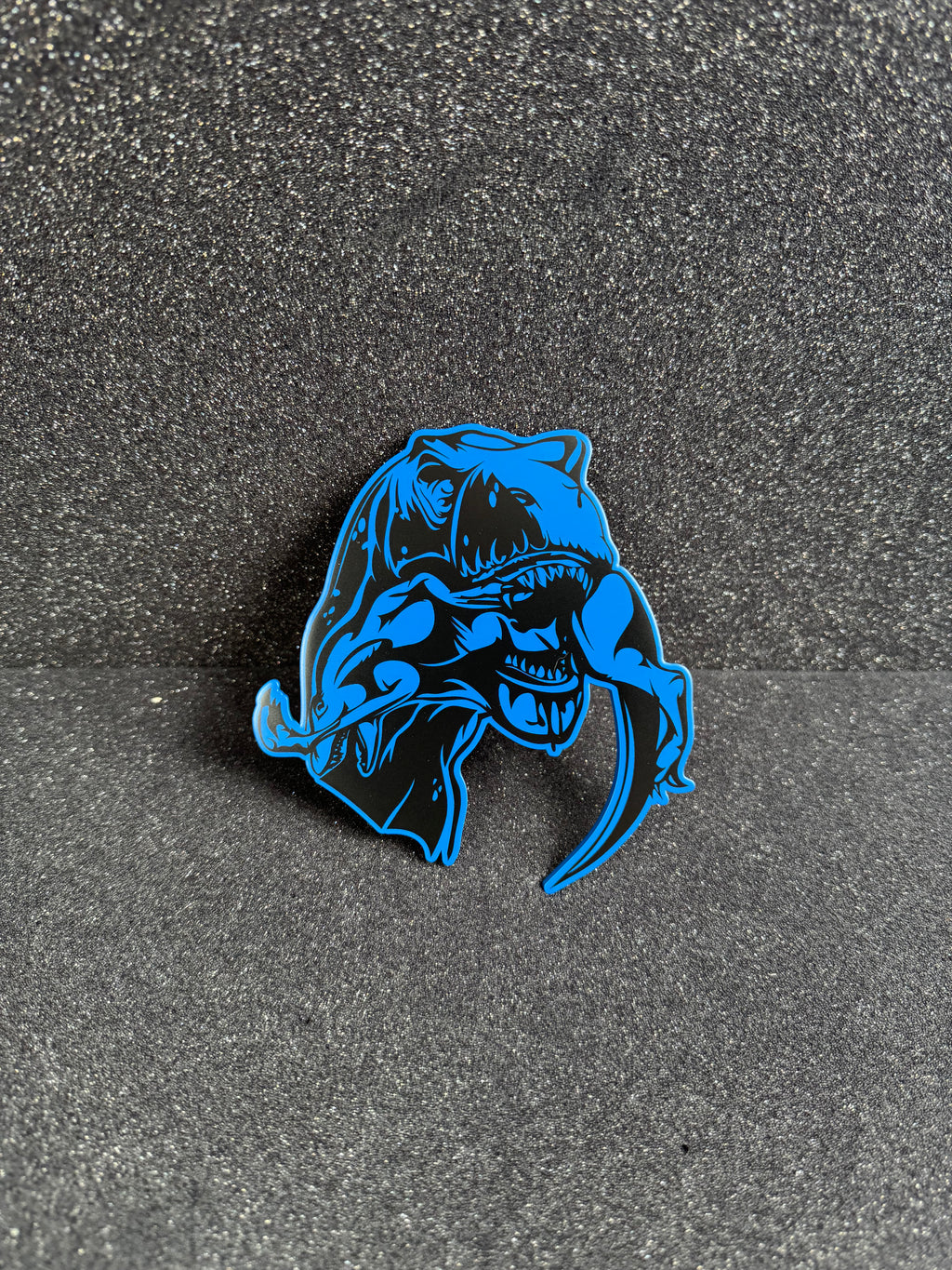 Trex eats raptor badge