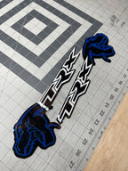 TREX/TRX combo badge pair