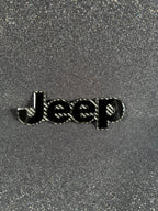 Jeep Grand Cherokee rear badge