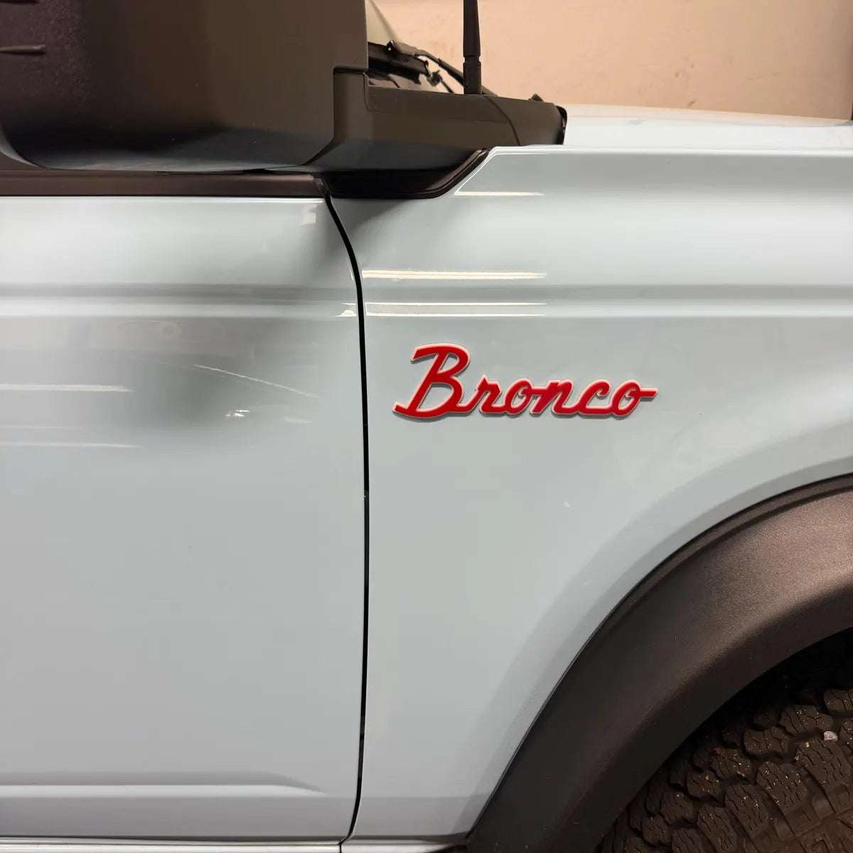 Bronco script badge