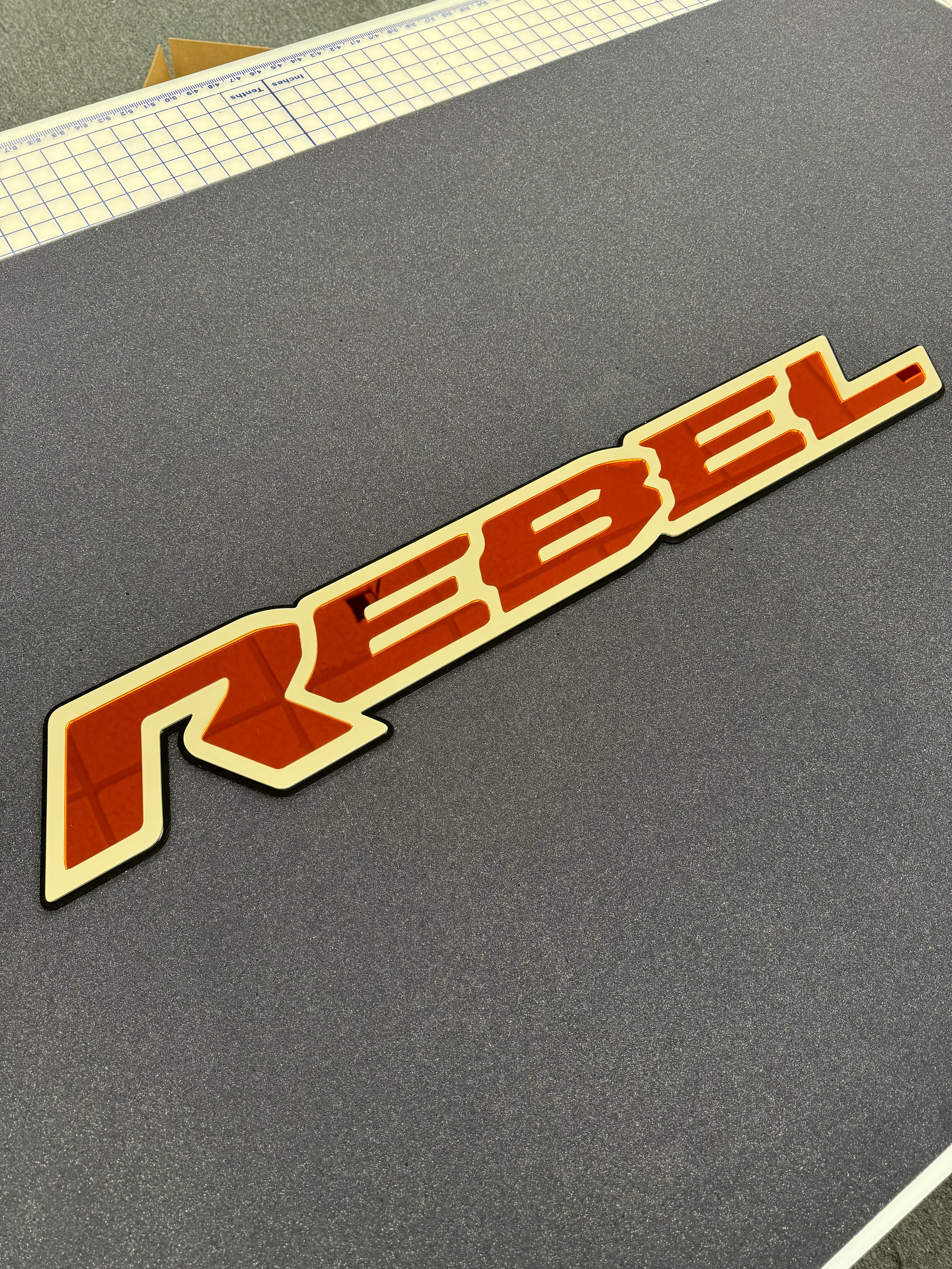 Rebel Grille badge replacement