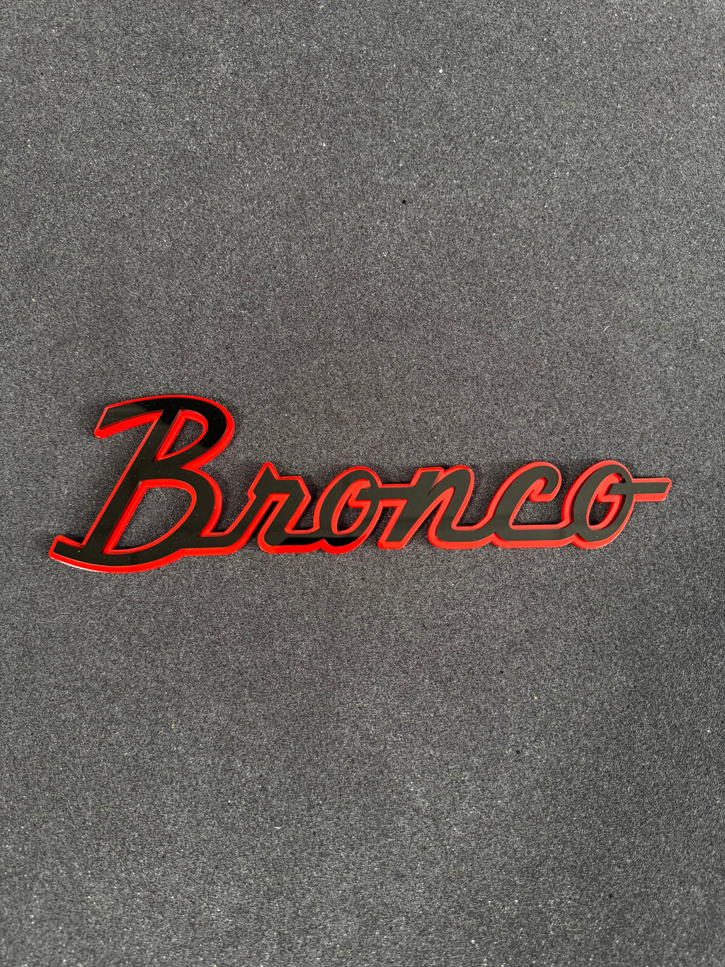 Bronco script badge