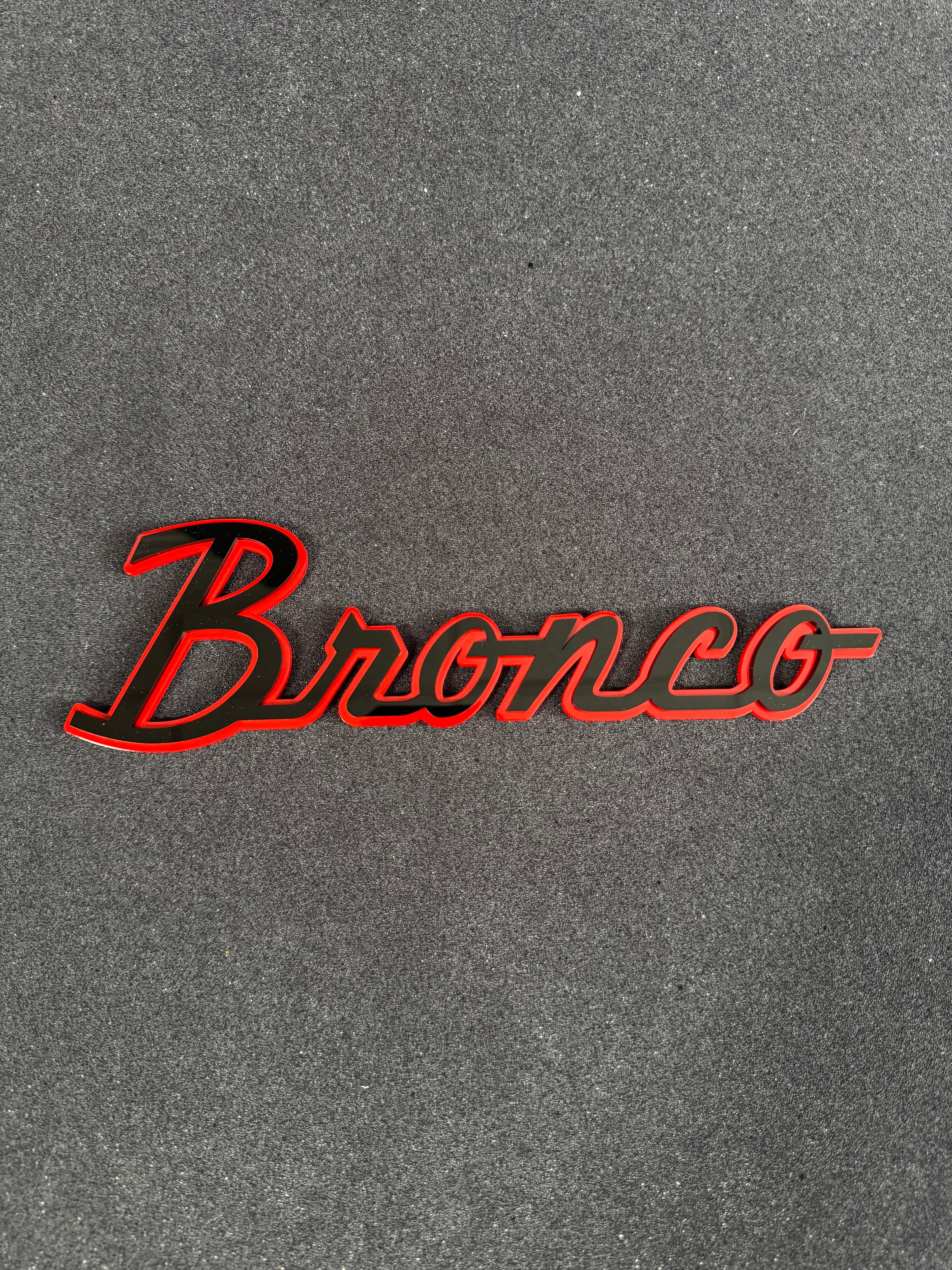 Bronco script badge