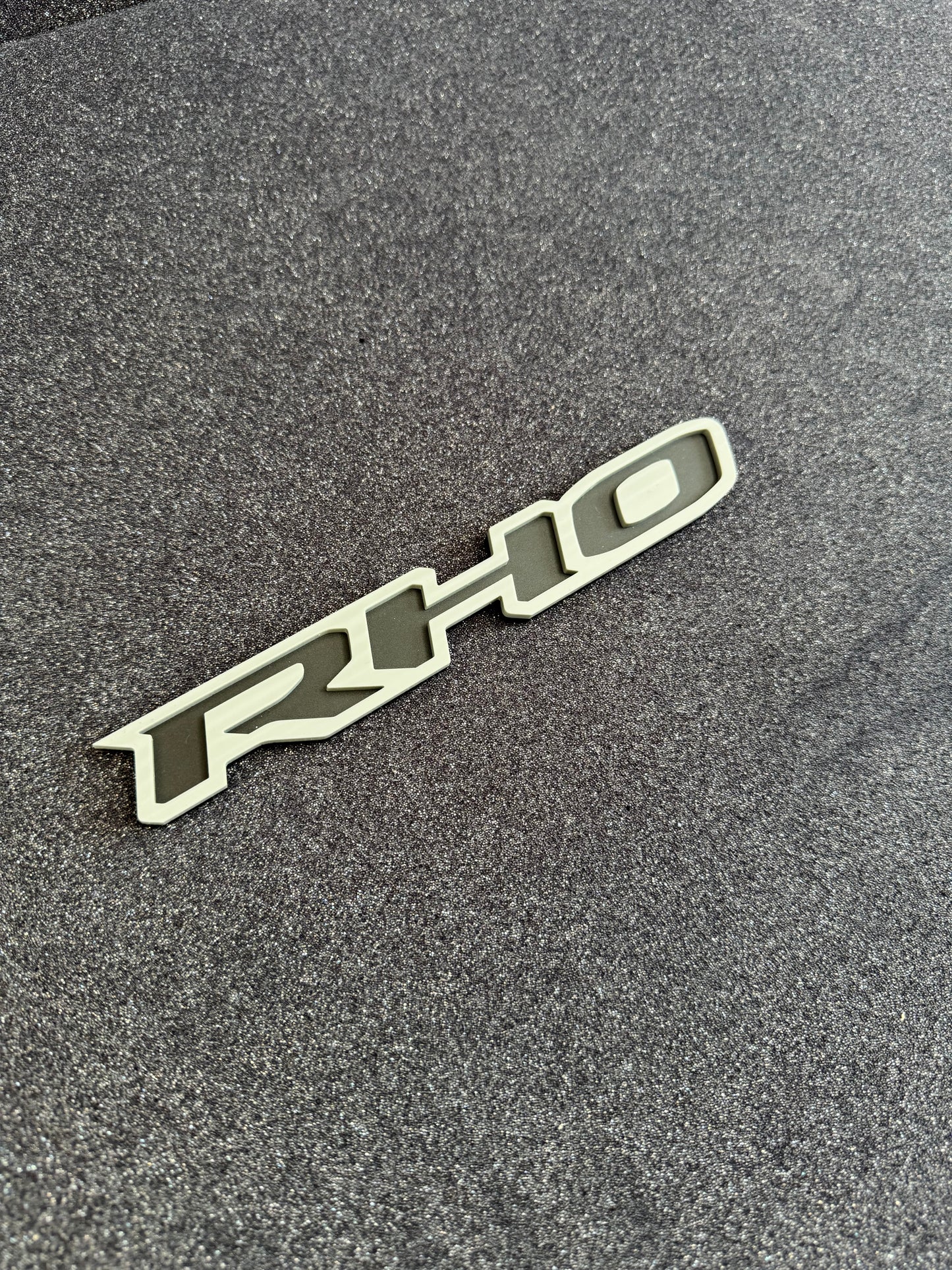 RHO small grille badge