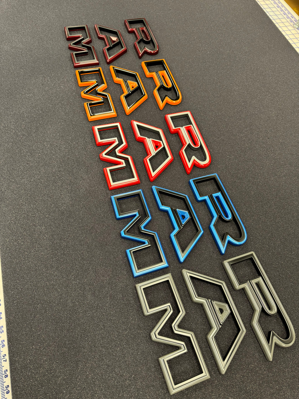 Color matched 3D RAM grille letters