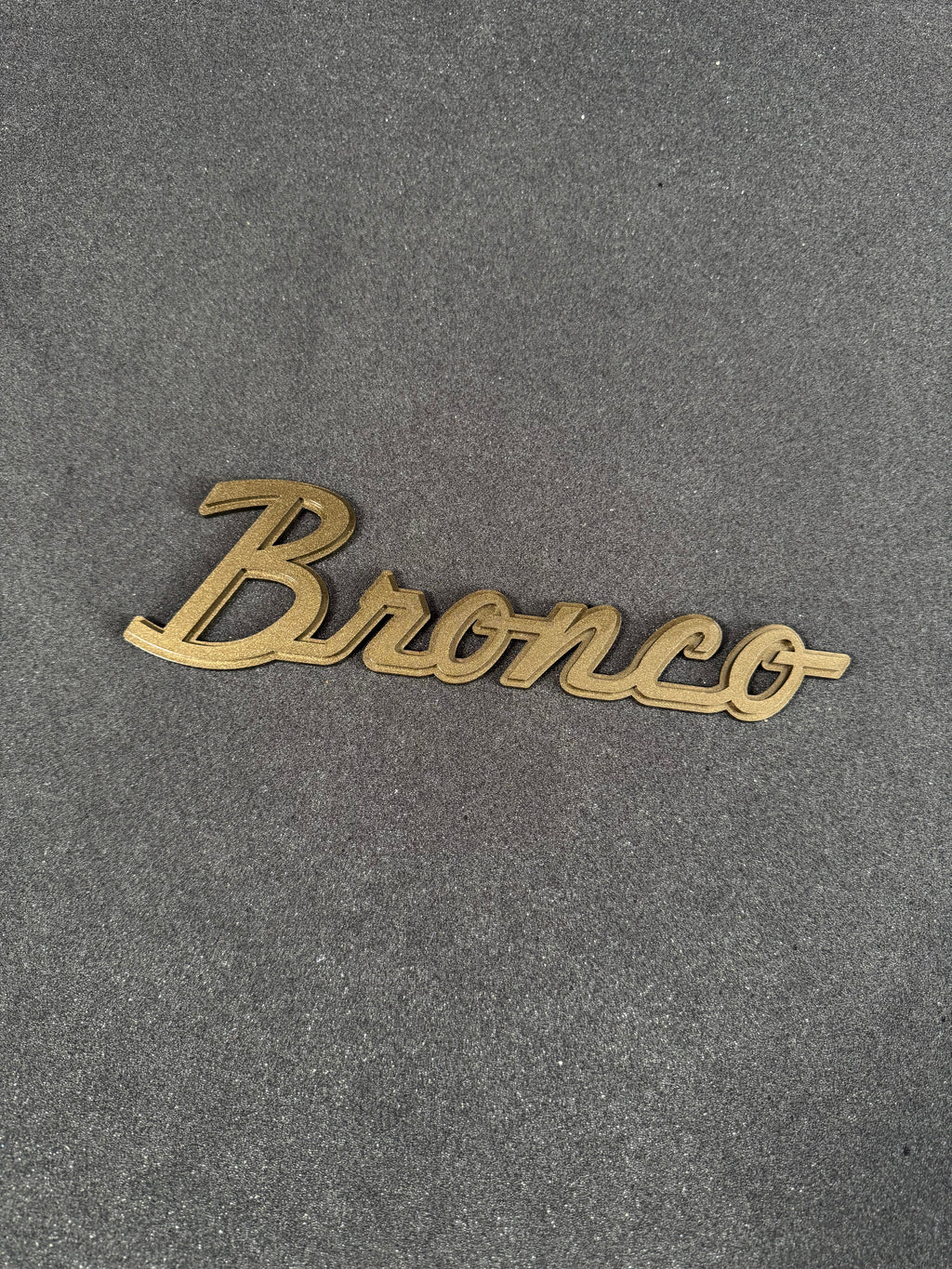 Bronco script badge