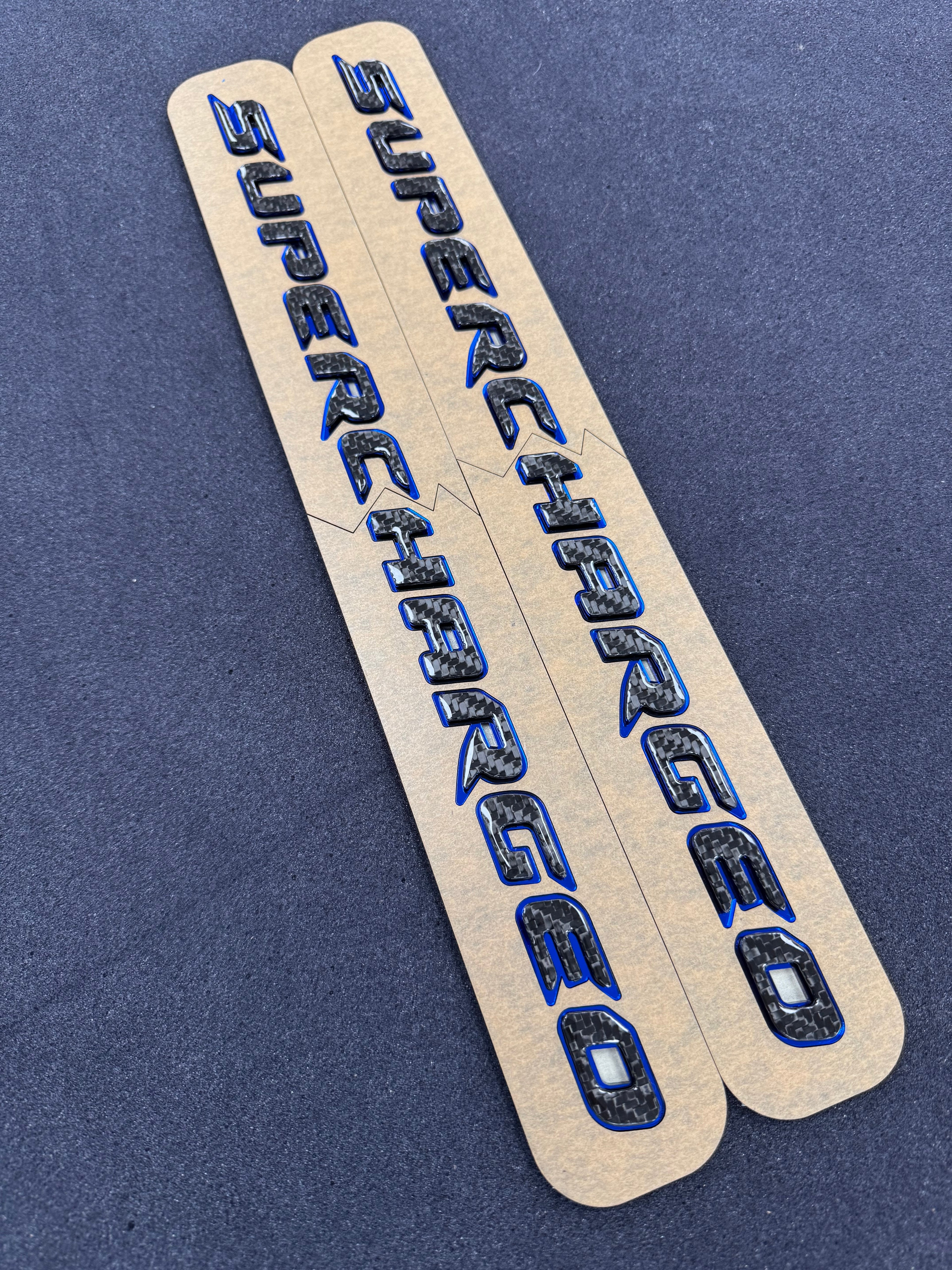 Trackhawk supercharged badge pair